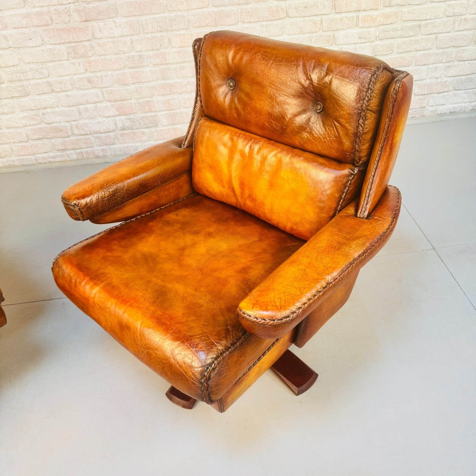 Pair Danish Swivel Chairs Tan Bison Leather Hand Plaited Lounge Chairs