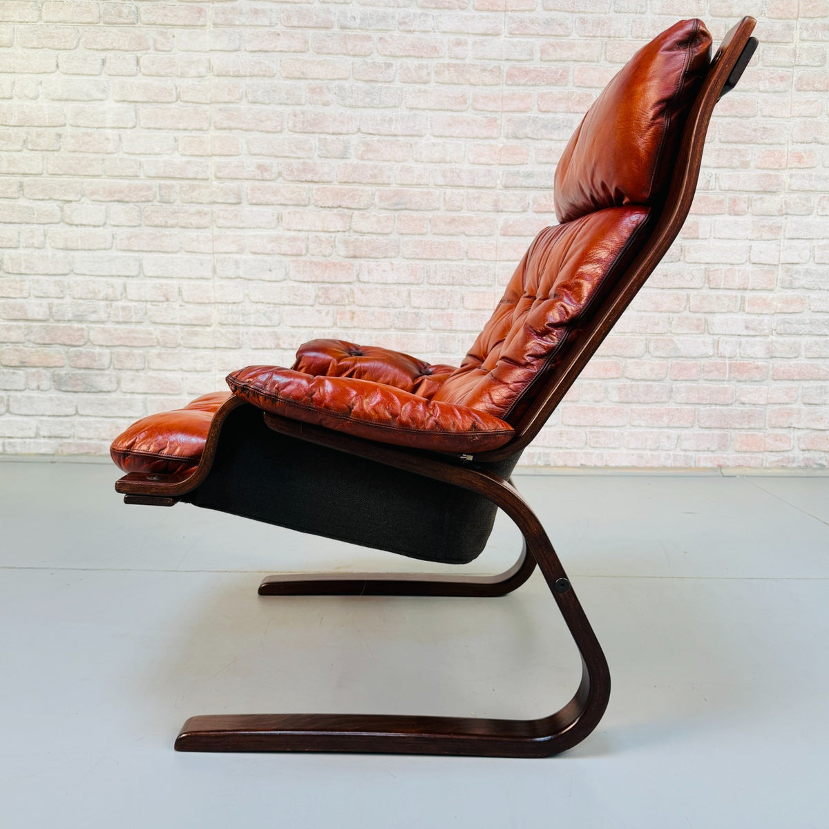 1970s Vintage Scandinavian Cognac Leather Cantilever Armchair Bentwood Frame