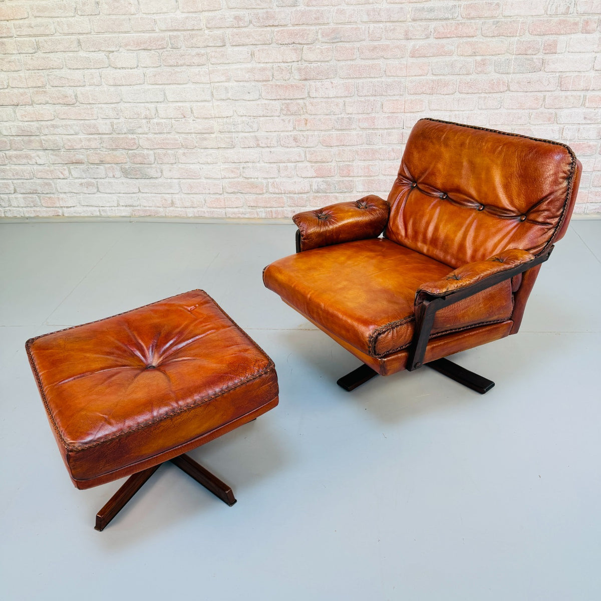 Vintage 1970s Arne Norell Swedish Tan Leather Swivel Chair & Footstool