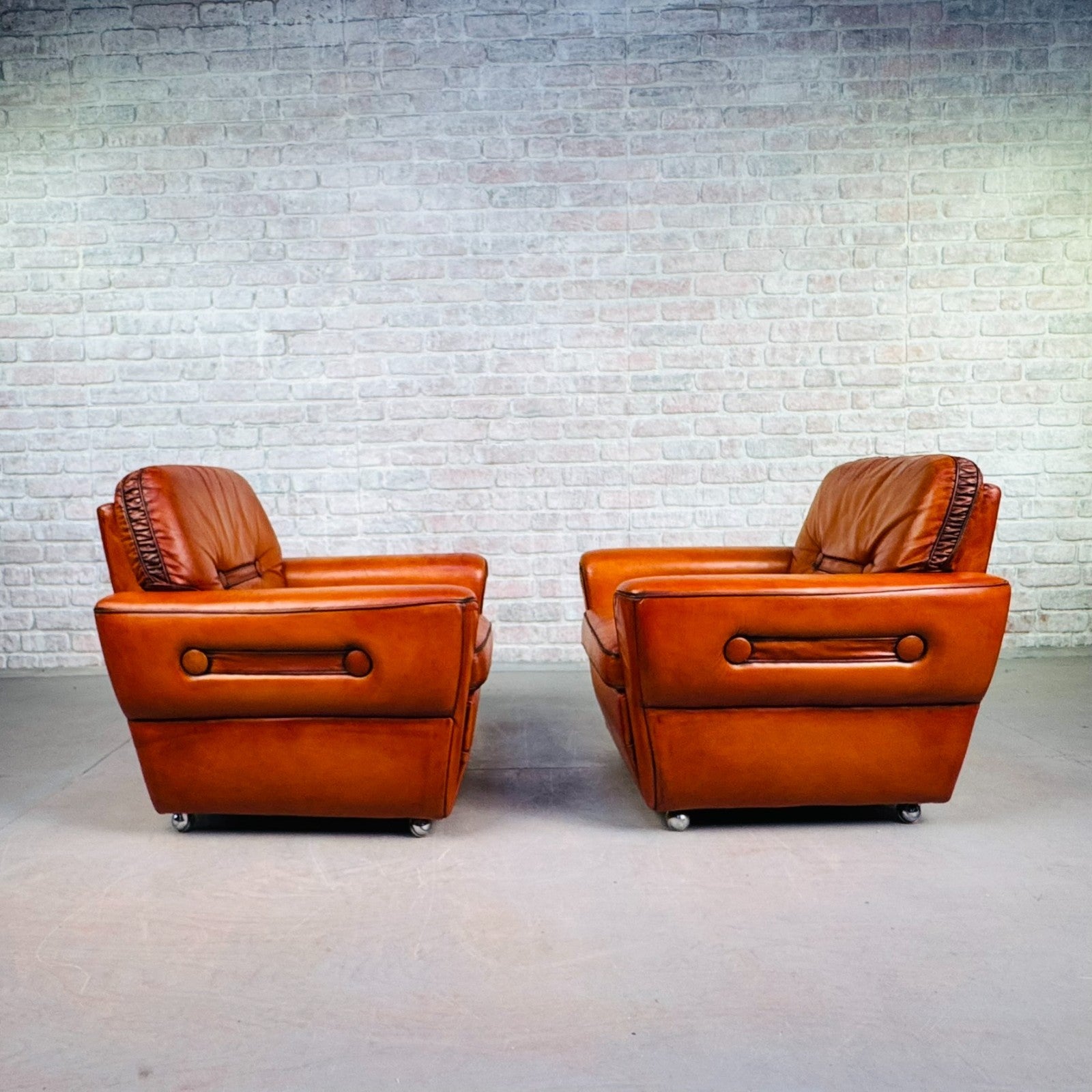Pair of Elegant Danish Tan Leather Lounge Chairs