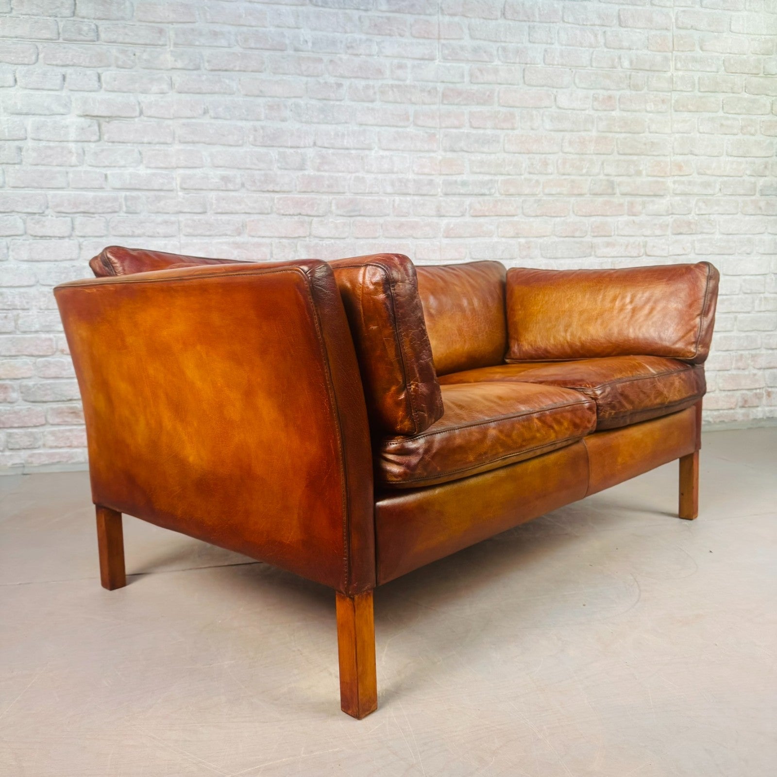 Vintage Stouby Tan Two-Seater Sofa Danish Buffalo Leather Feather Cushions