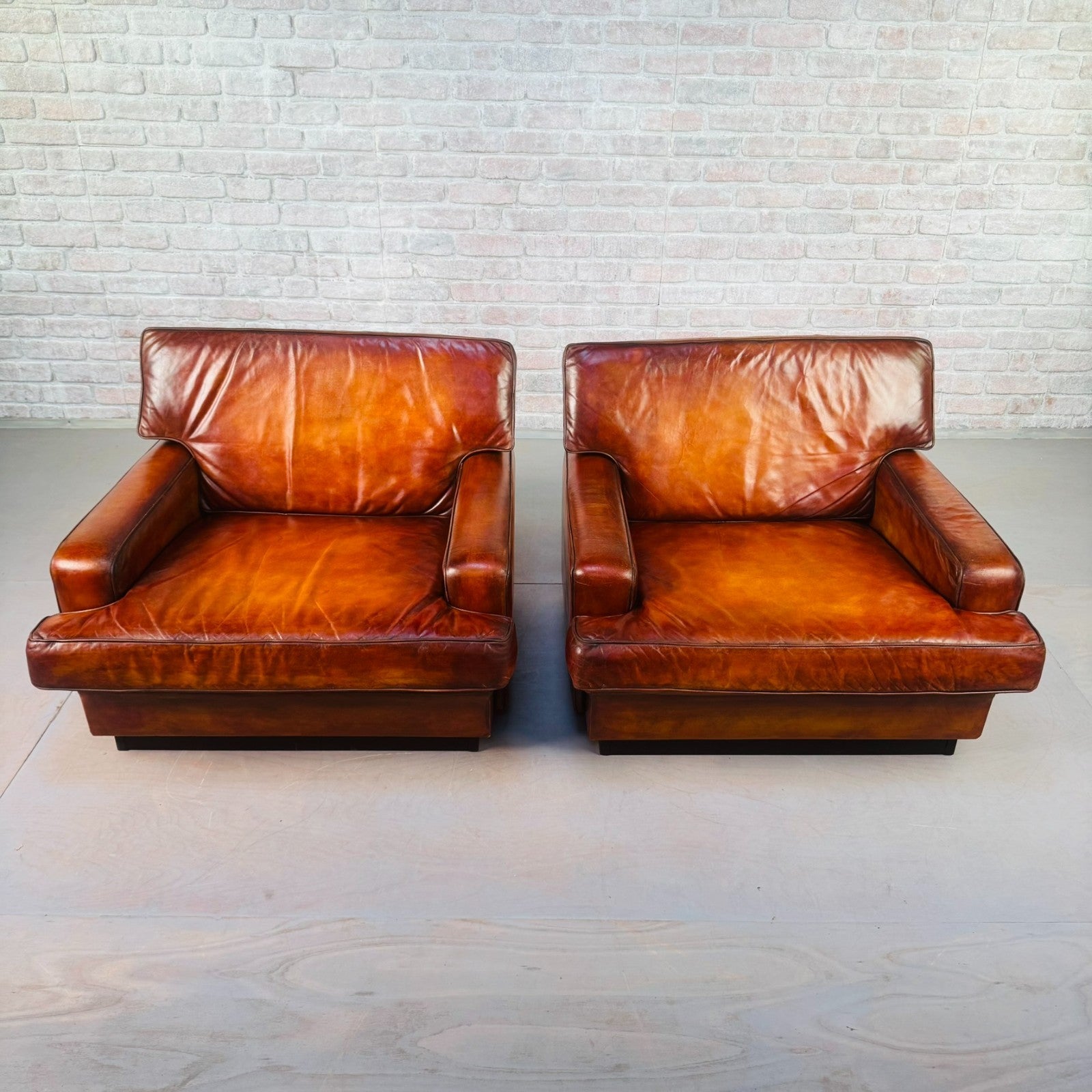 Pair of Arne Norell Swedish Tan Leather Lounge Chairs