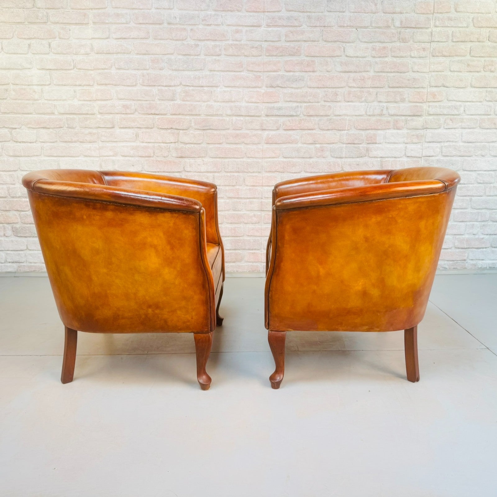 Vintage Pair of Danish Light Tan Leather Tub Chairs