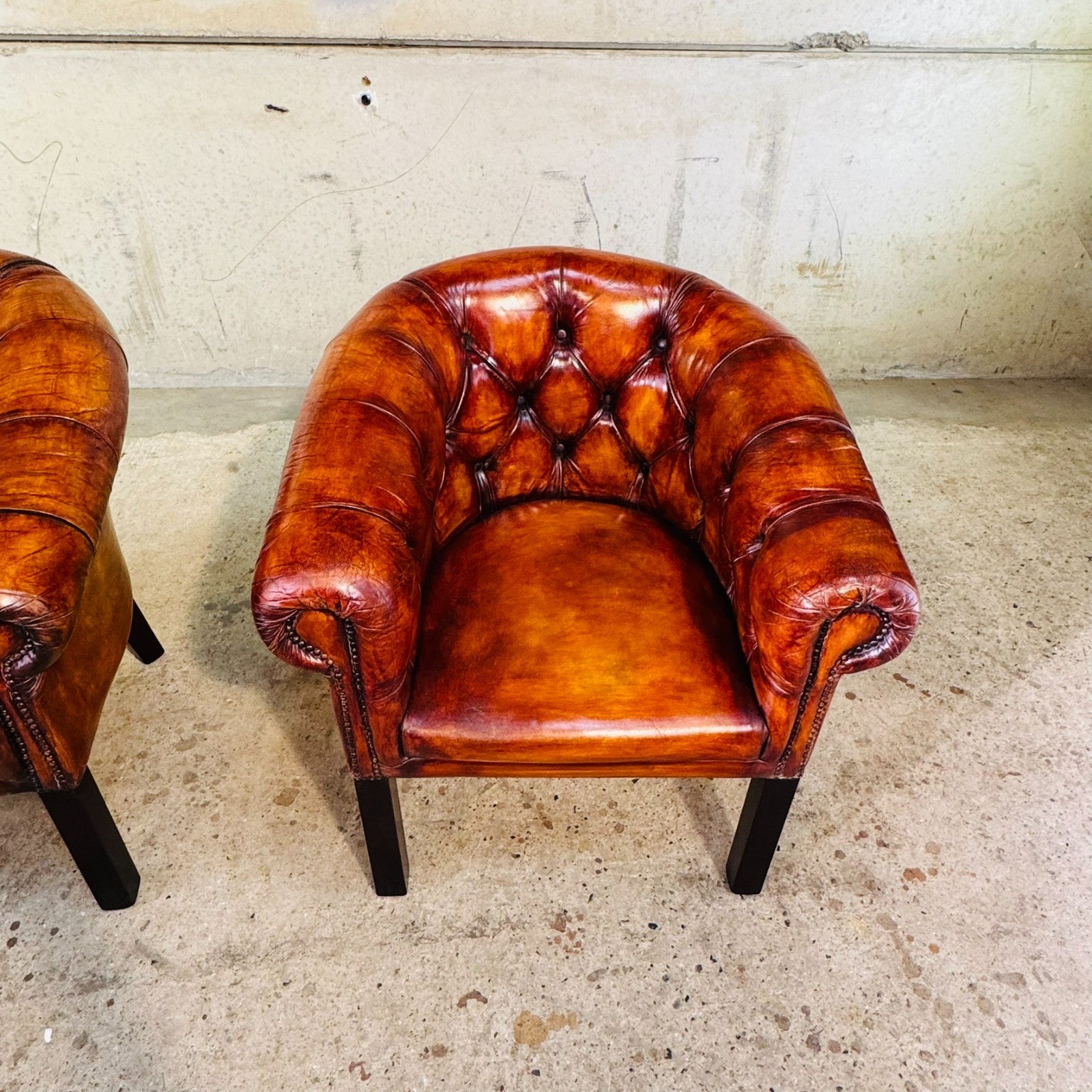 Pair of Elegant English Made Vintage Chesterfield Tan Leather Tub Chairs