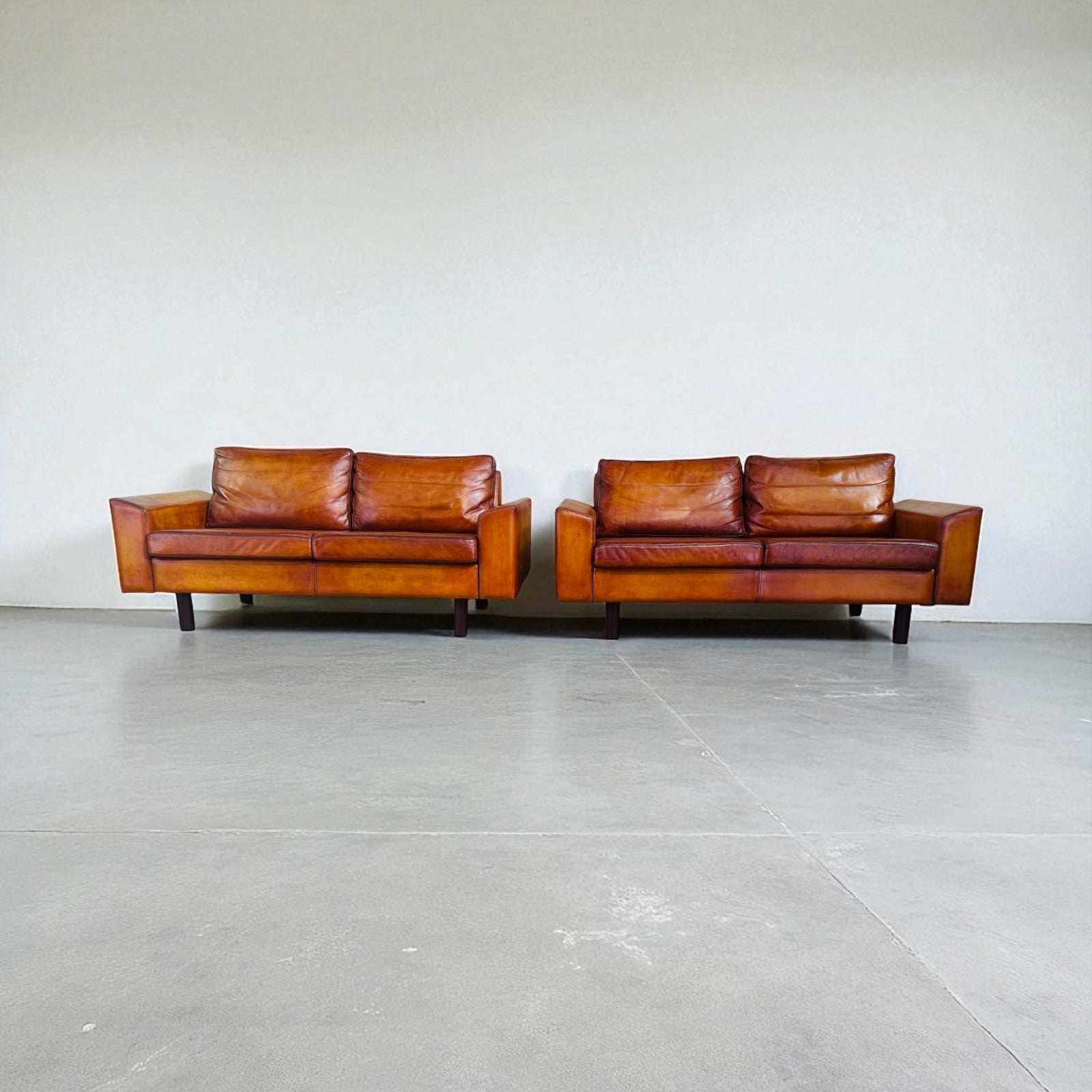Vintage Pair of Mogens Hansen Tan Leather Two-Seater Sofas
