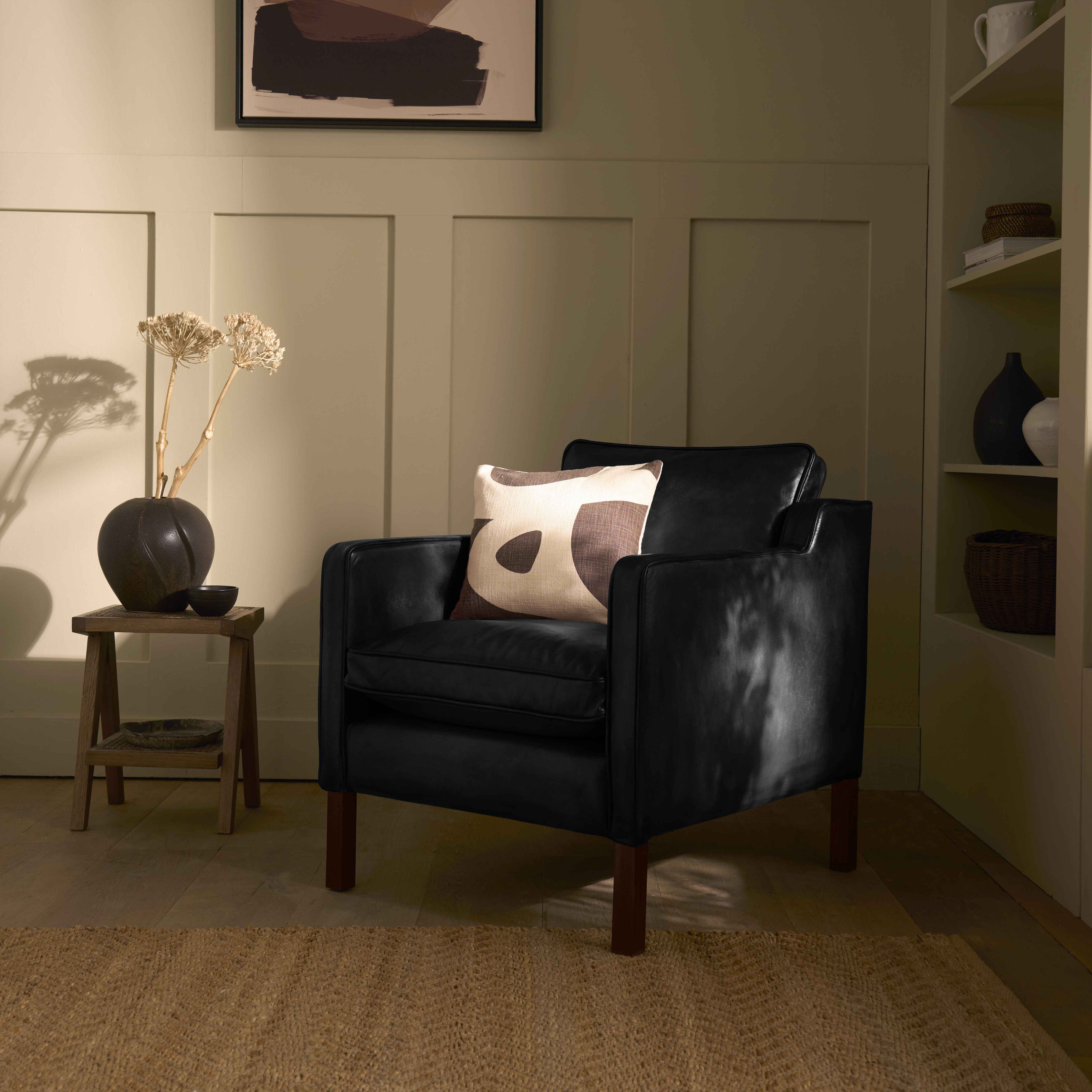 luxury-hand-dyed-mid-century-black-leather-armchair-cottage-side