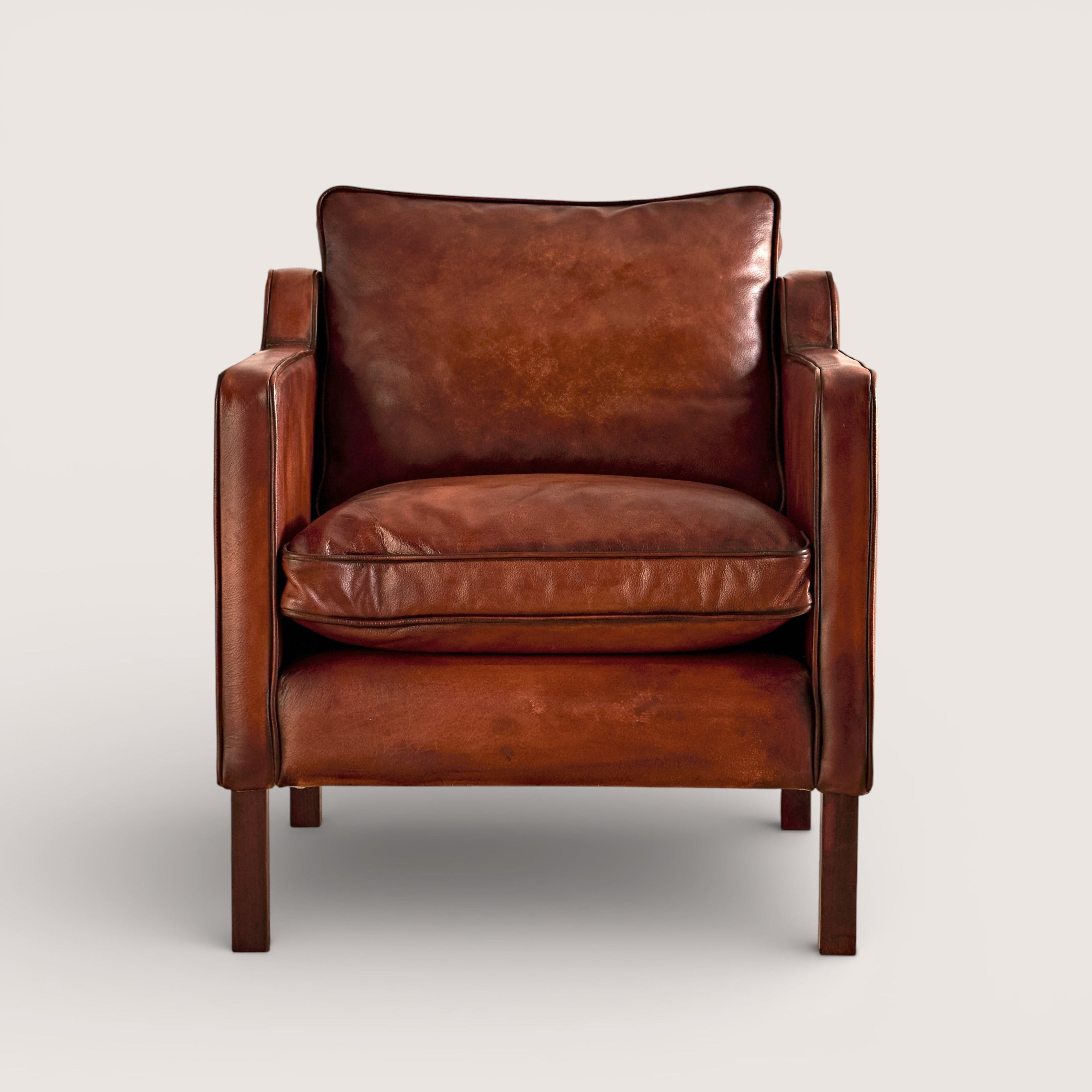 luxury-hand-dyed-mid-century-cigar-brown-leather-armchair-white-background-front