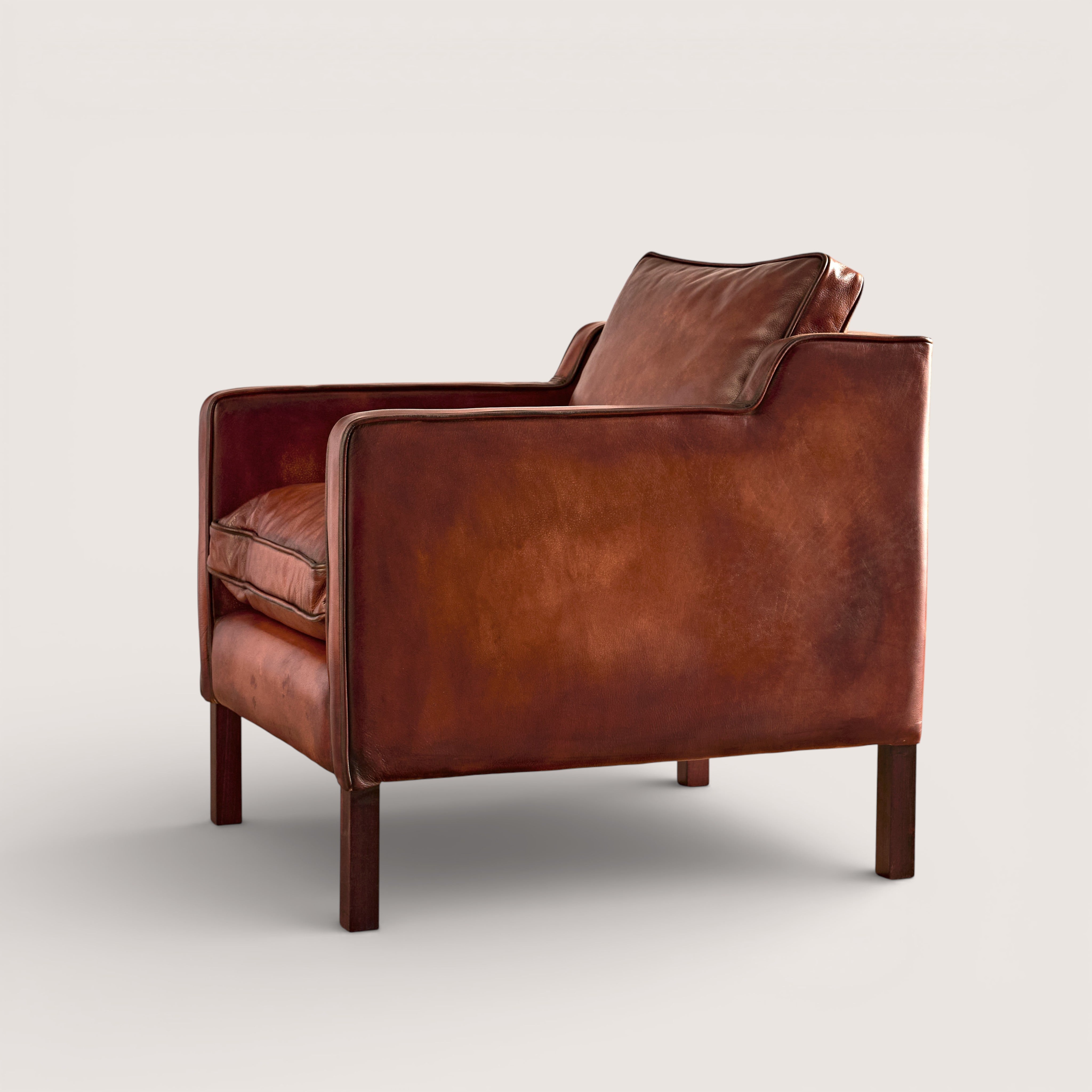 luxury-hand-dyed-mid-century-cigar-brown-leather-armchair-white-background-side