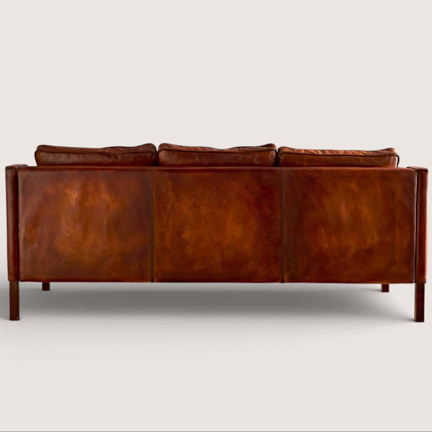 luxury-hand-dyed-mid-century-cigar-brown-tan-leather-three-seater-sofa-white-background-back