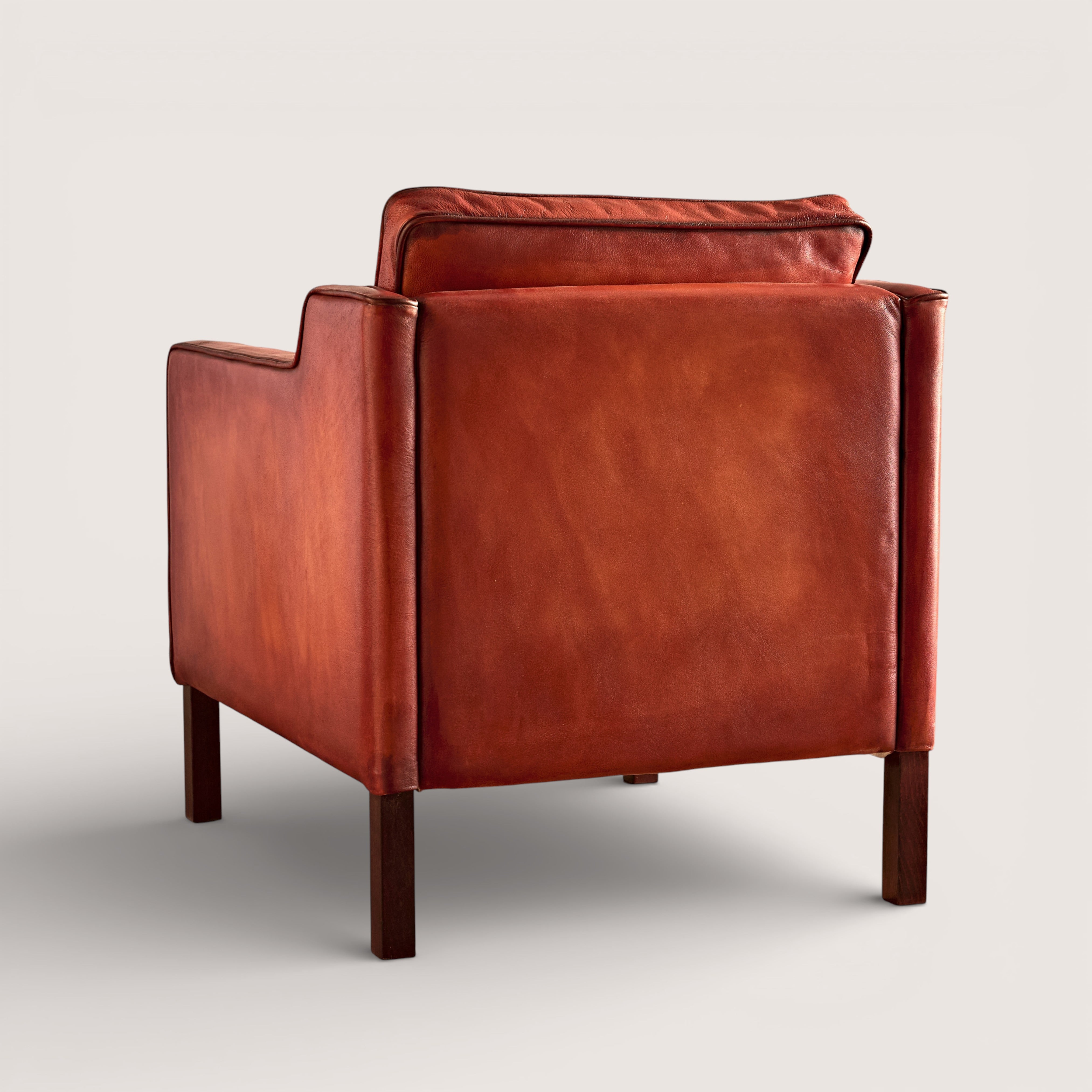luxury-hand-dyed-mid-century-cognac-tan-leather-armchair-white-background-back