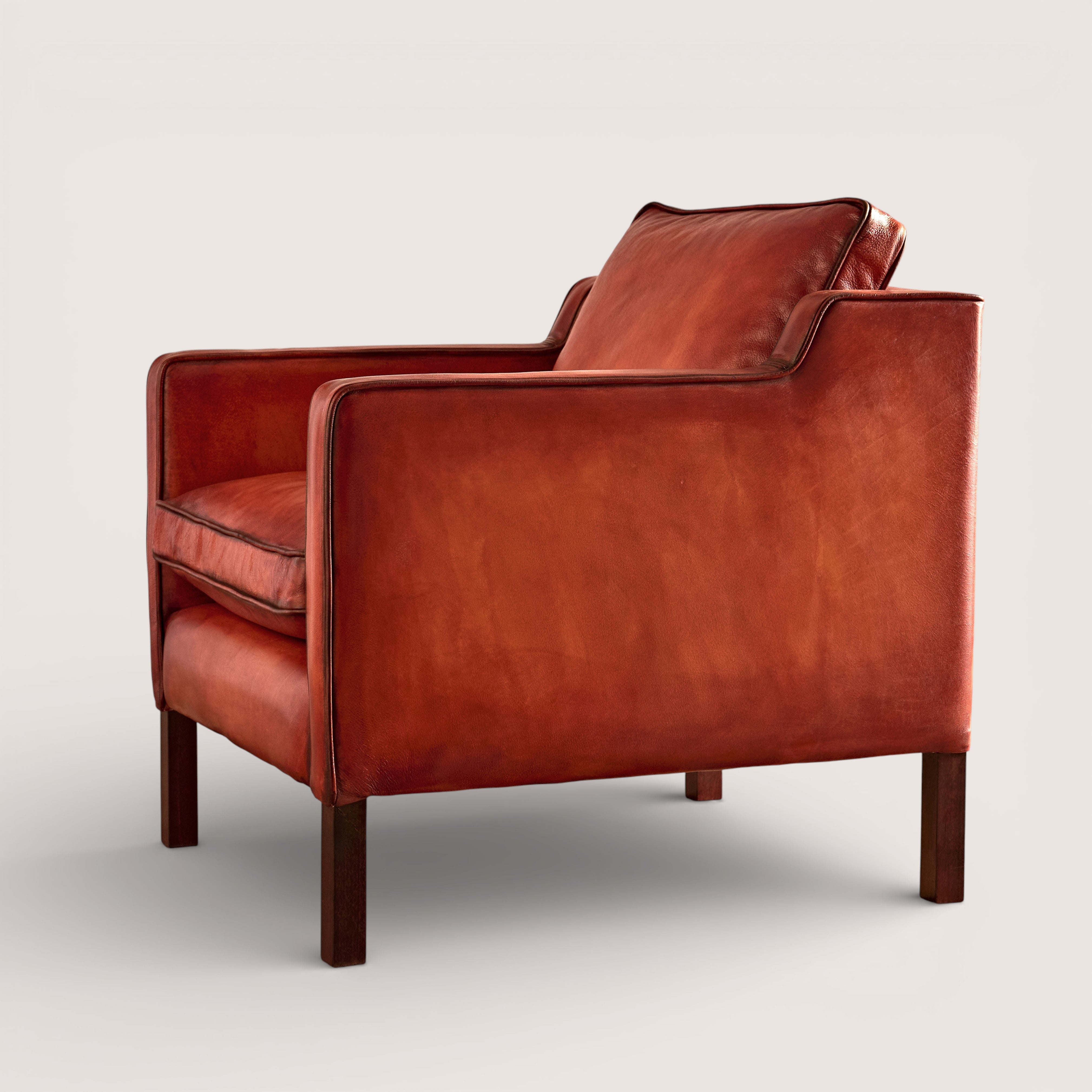luxury-hand-dyed-mid-century-cognac-tan-leather-armchair-white-background-side
