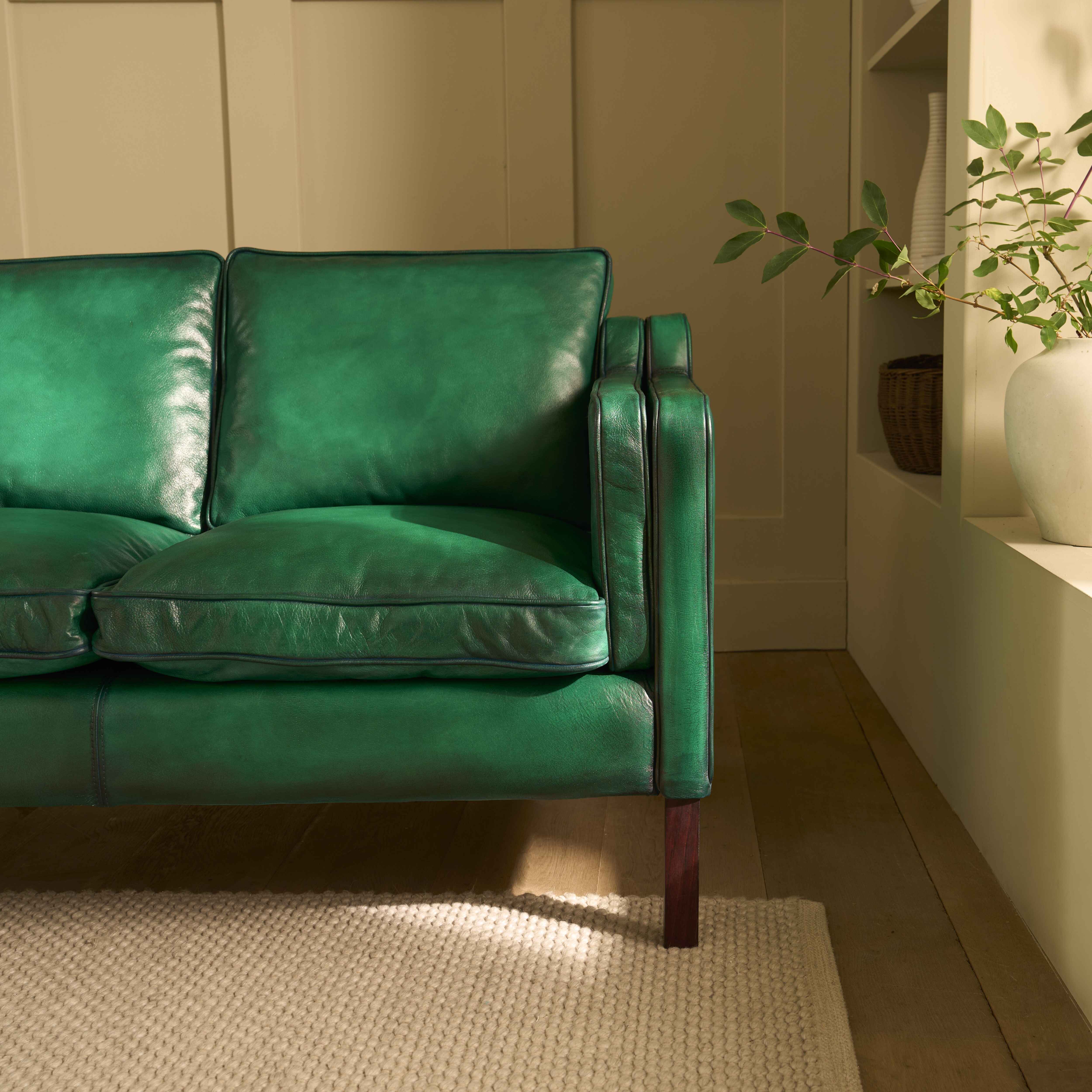 luxury-hand-dyed-mid-century-green-leather-three-seater-sofa-cottage-front