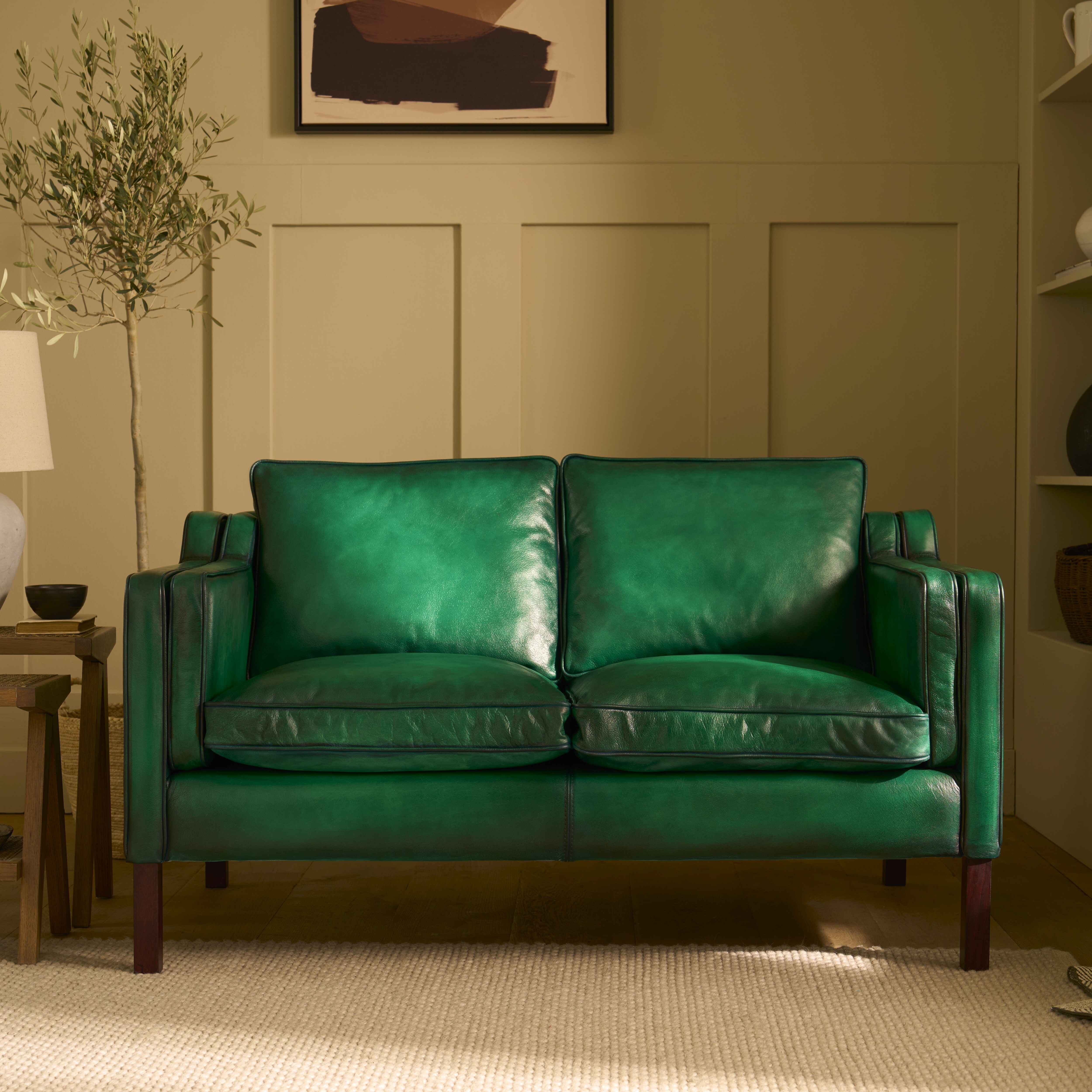 luxury-hand-dyed-mid-century-green-leather-two-seater-sofa-cottage-front