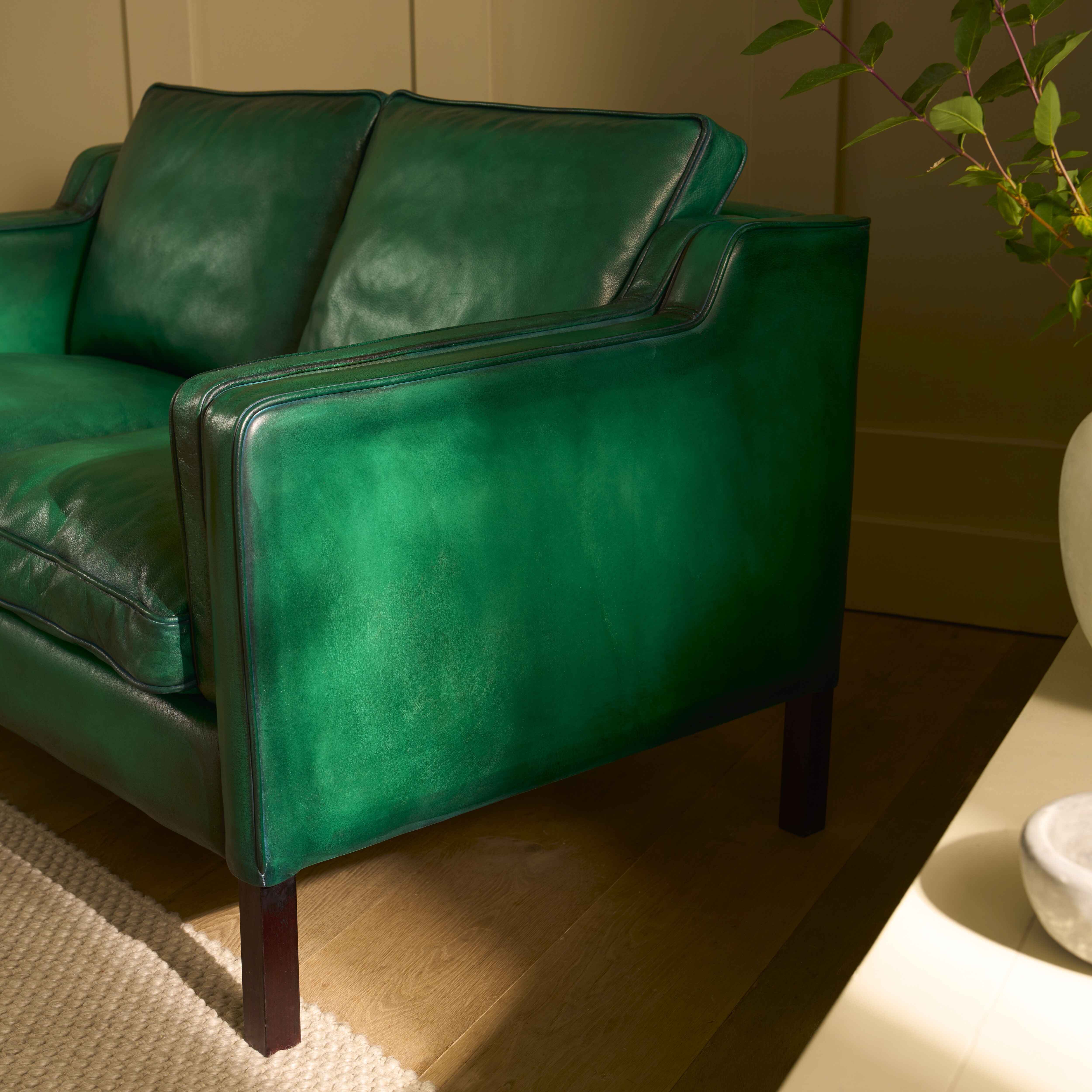 luxury-hand-dyed-mid-century-green-leather-two-seater-sofa-cottage-side