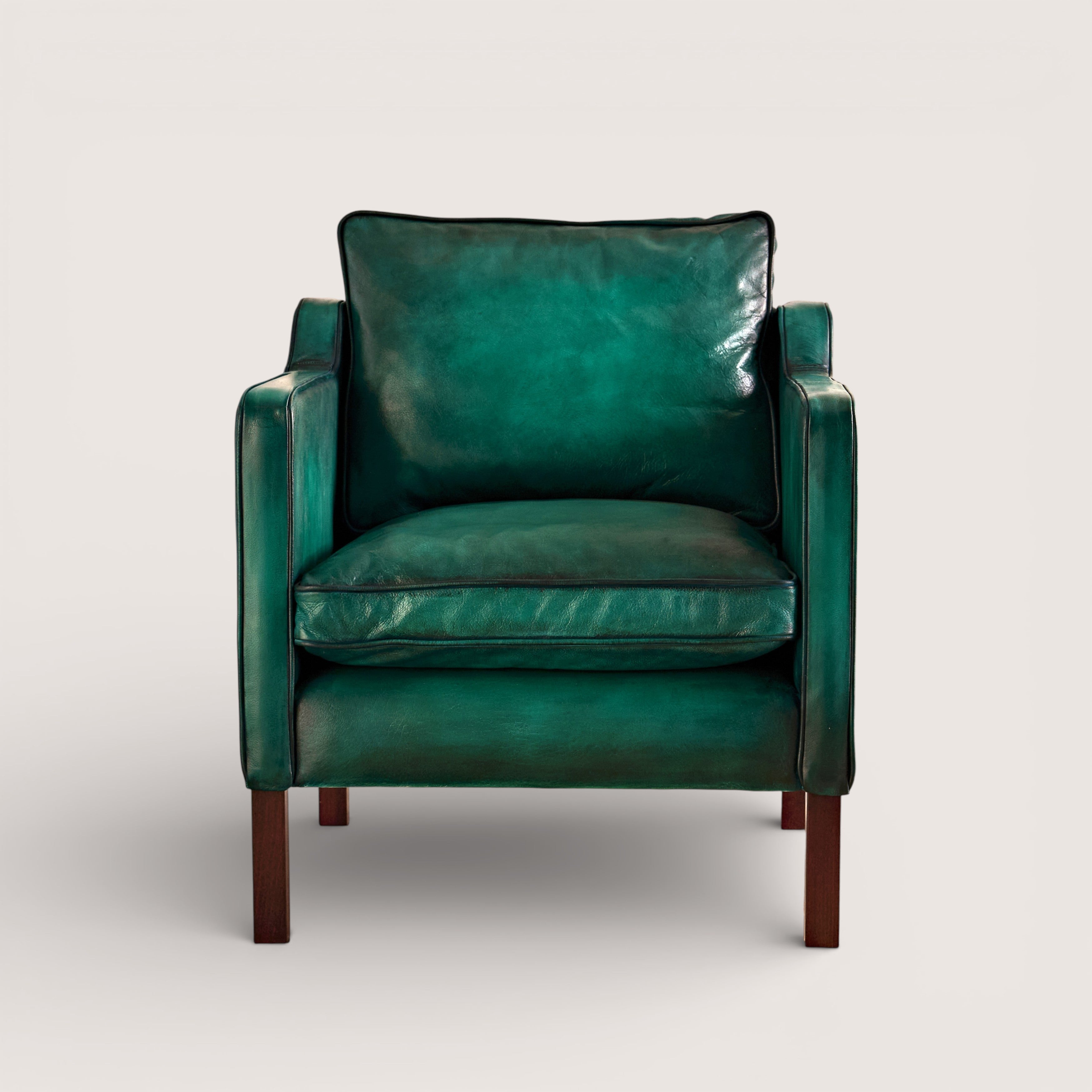 luxury-hand-dyed-mid-century-leather-armchair-white-background-front