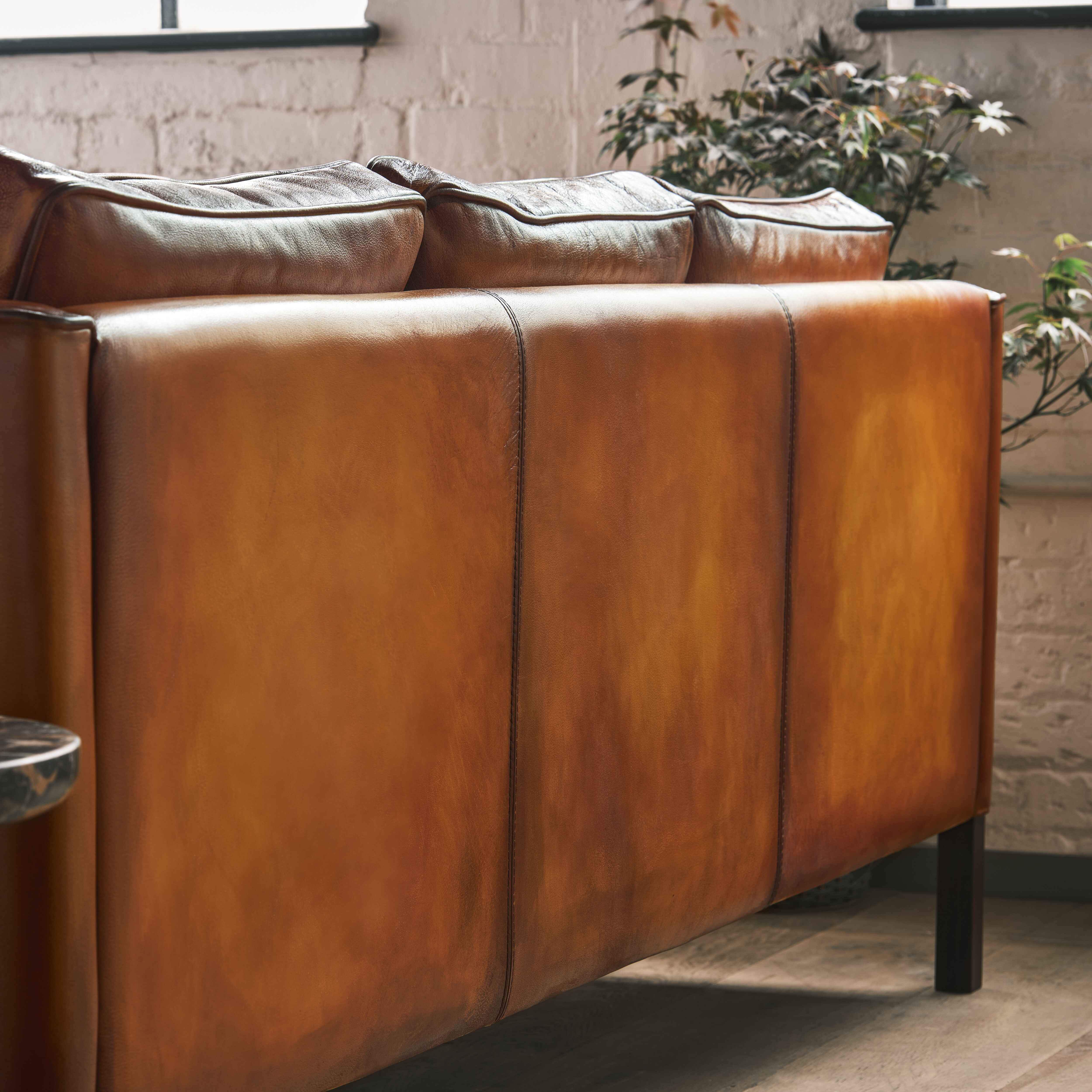 luxury-hand-dyed-mid-century-tan-leather-three-seater-sofa-industrial-back