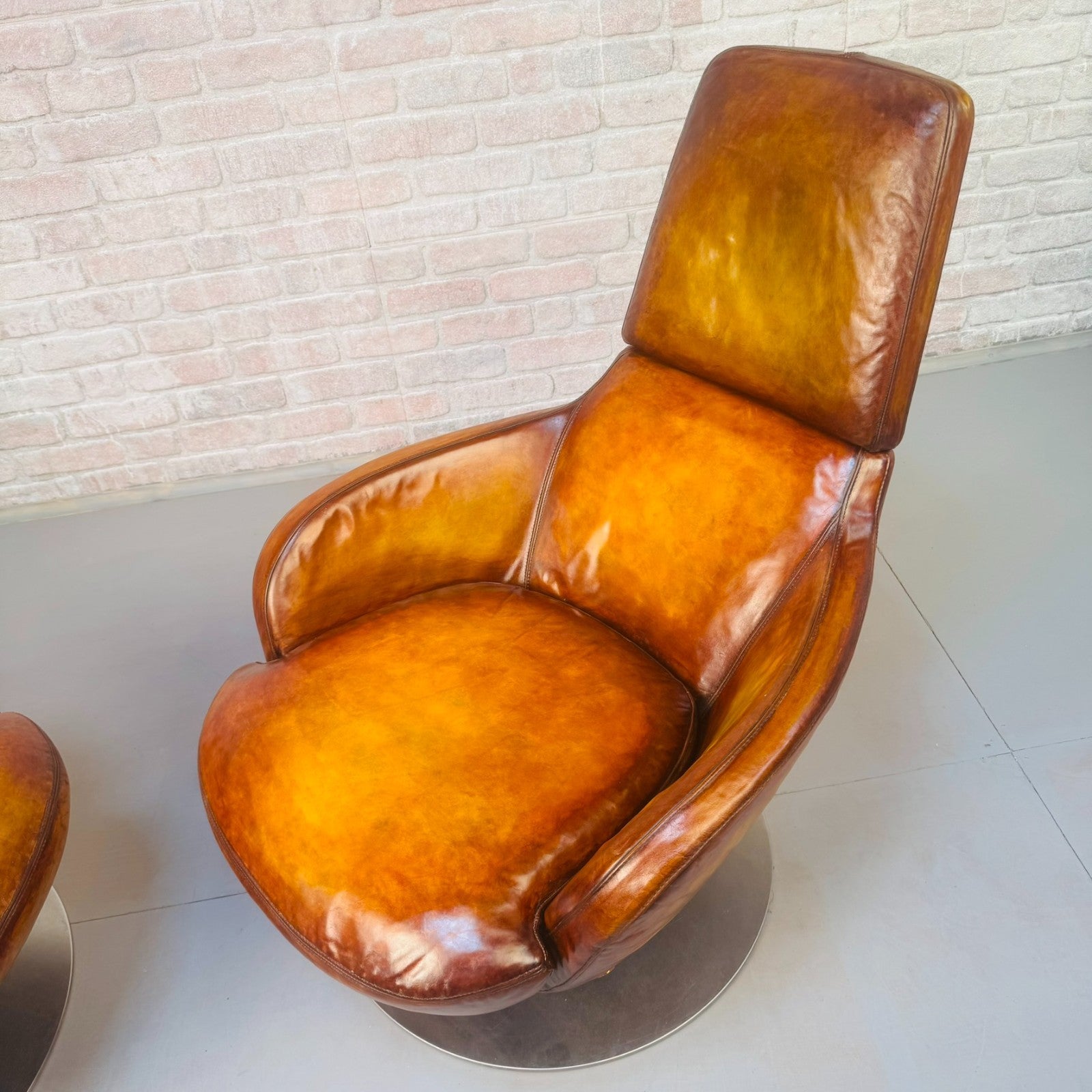 Pair of Vintage Italian Swivel Tan Leather Chairs