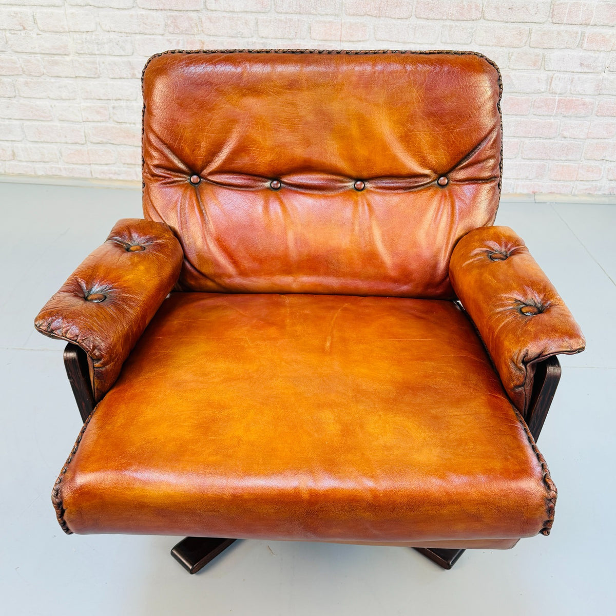 Vintage 1970s Arne Norell Swedish Tan Leather Swivel Chair & Footstool