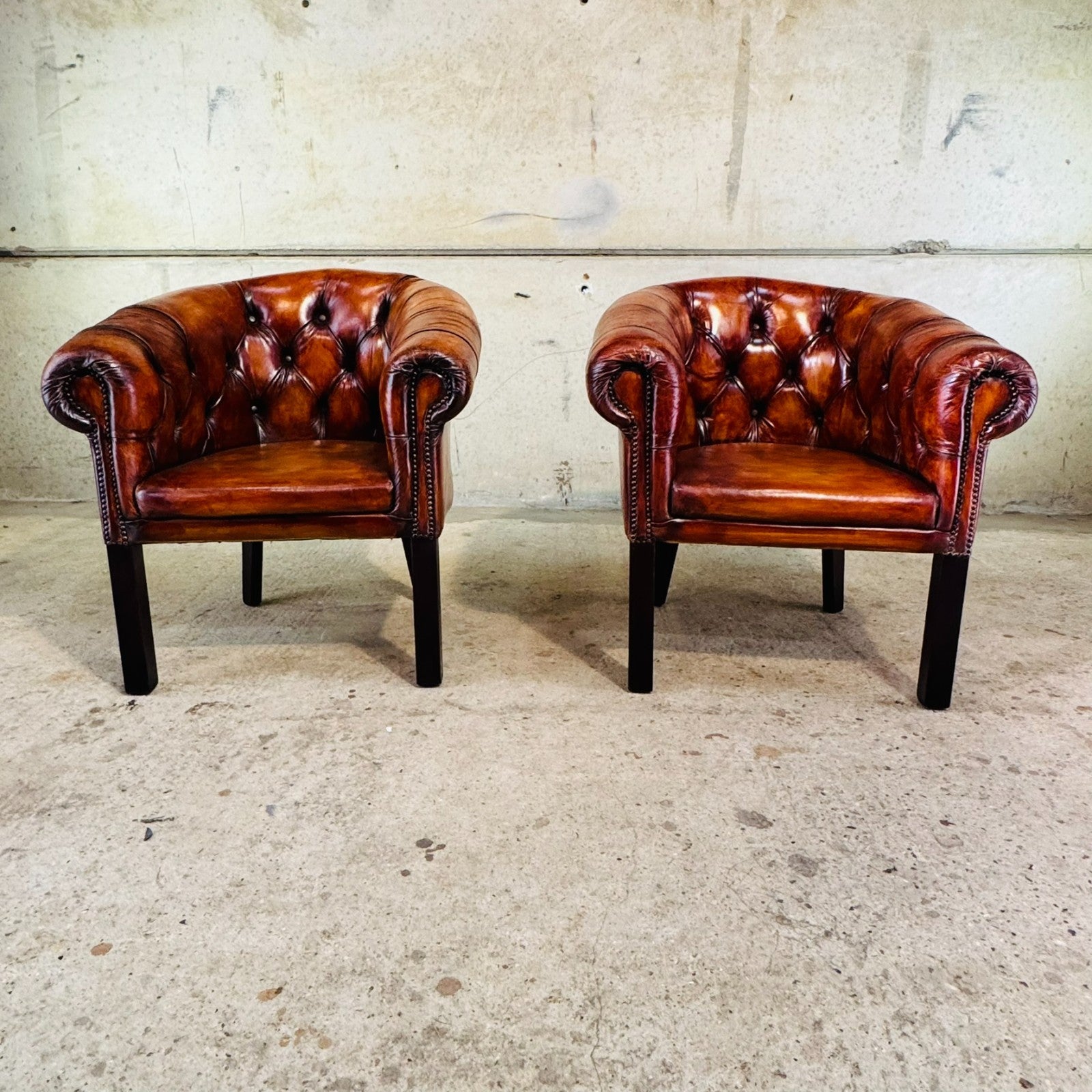 Pair of Elegant English Made Vintage Chesterfield Tan Leather Tub Chairs