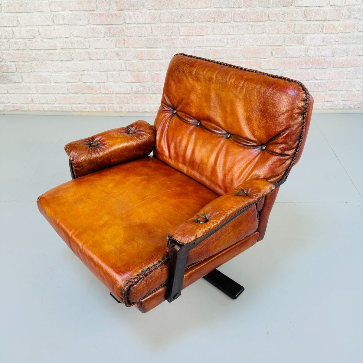 Vintage 1970s Arne Norell Swedish Tan Leather Swivel Chair & Footstool