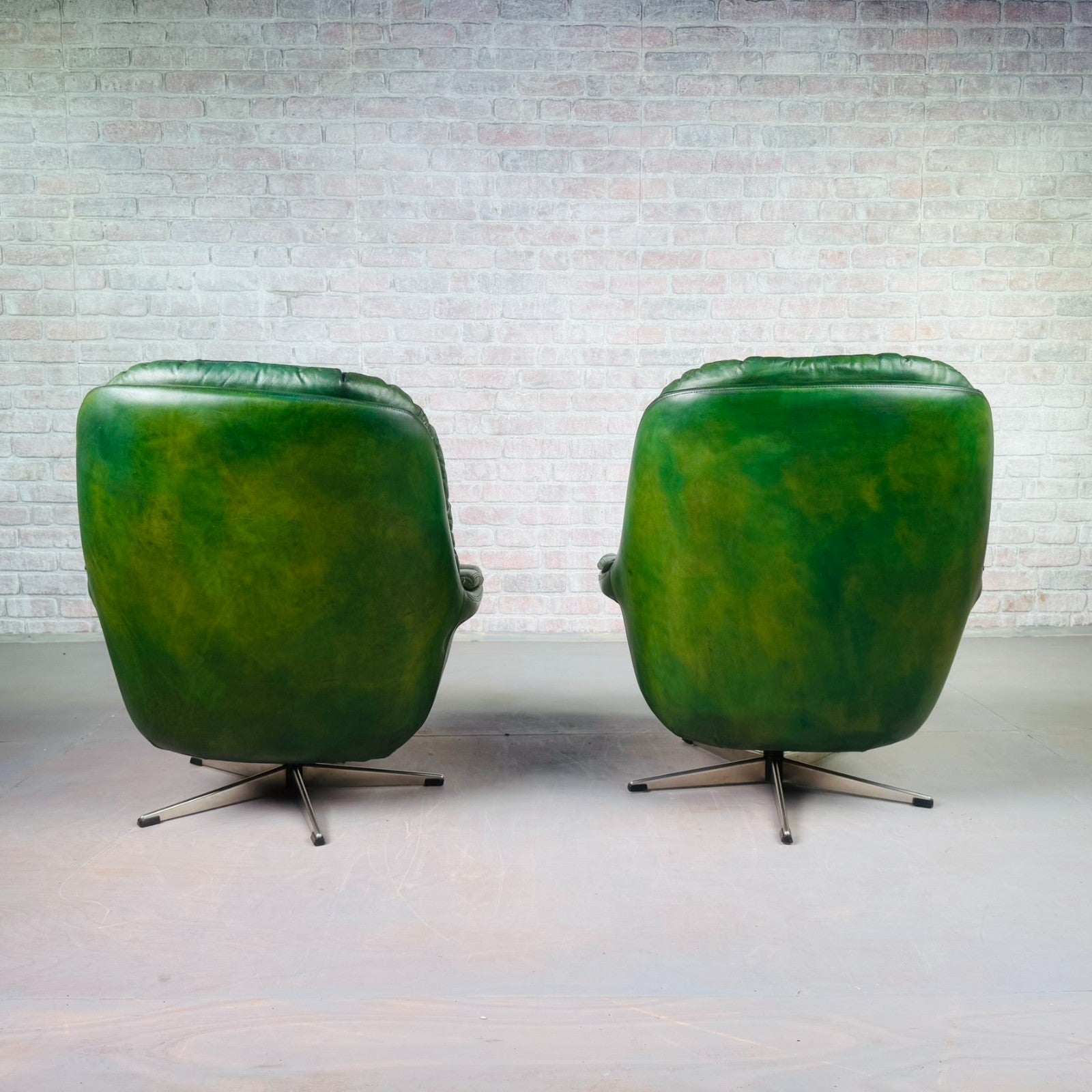 Pair of Vintage Danish Green Leather Swivel Chairs