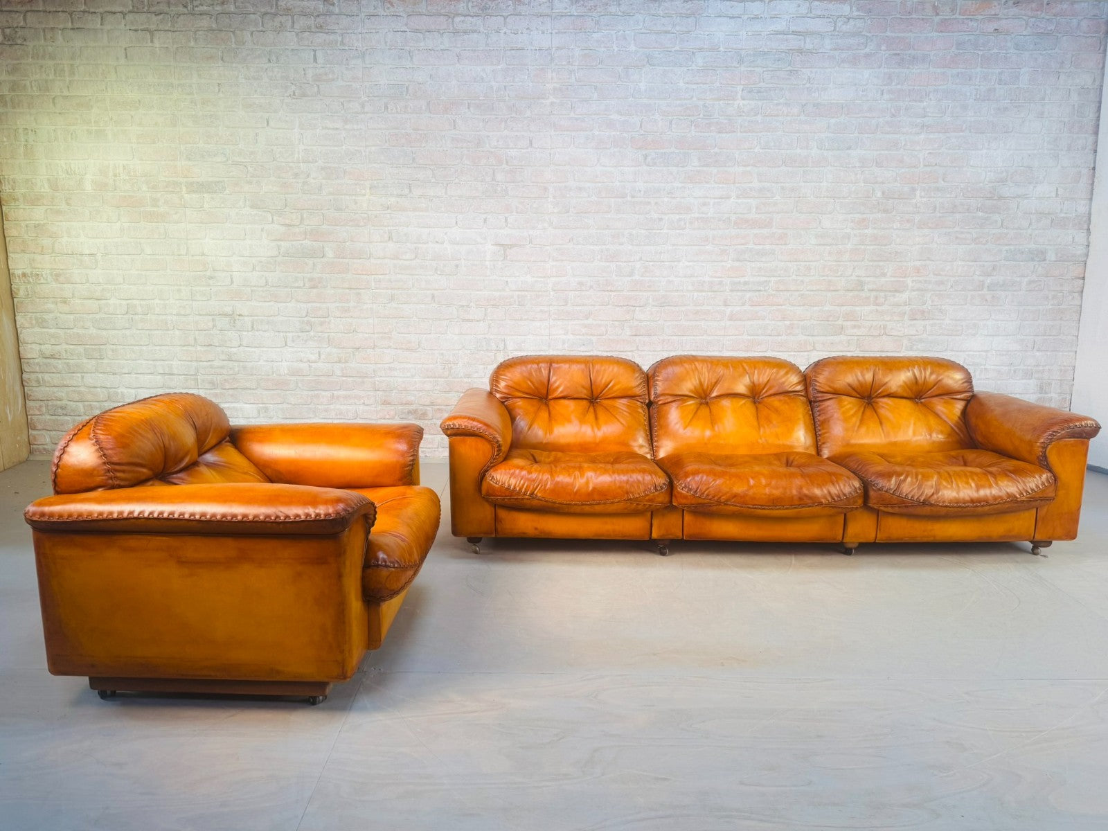 1970s Swiss De Sede DS-101 Tan Leather Three Seater & Armchair Suite