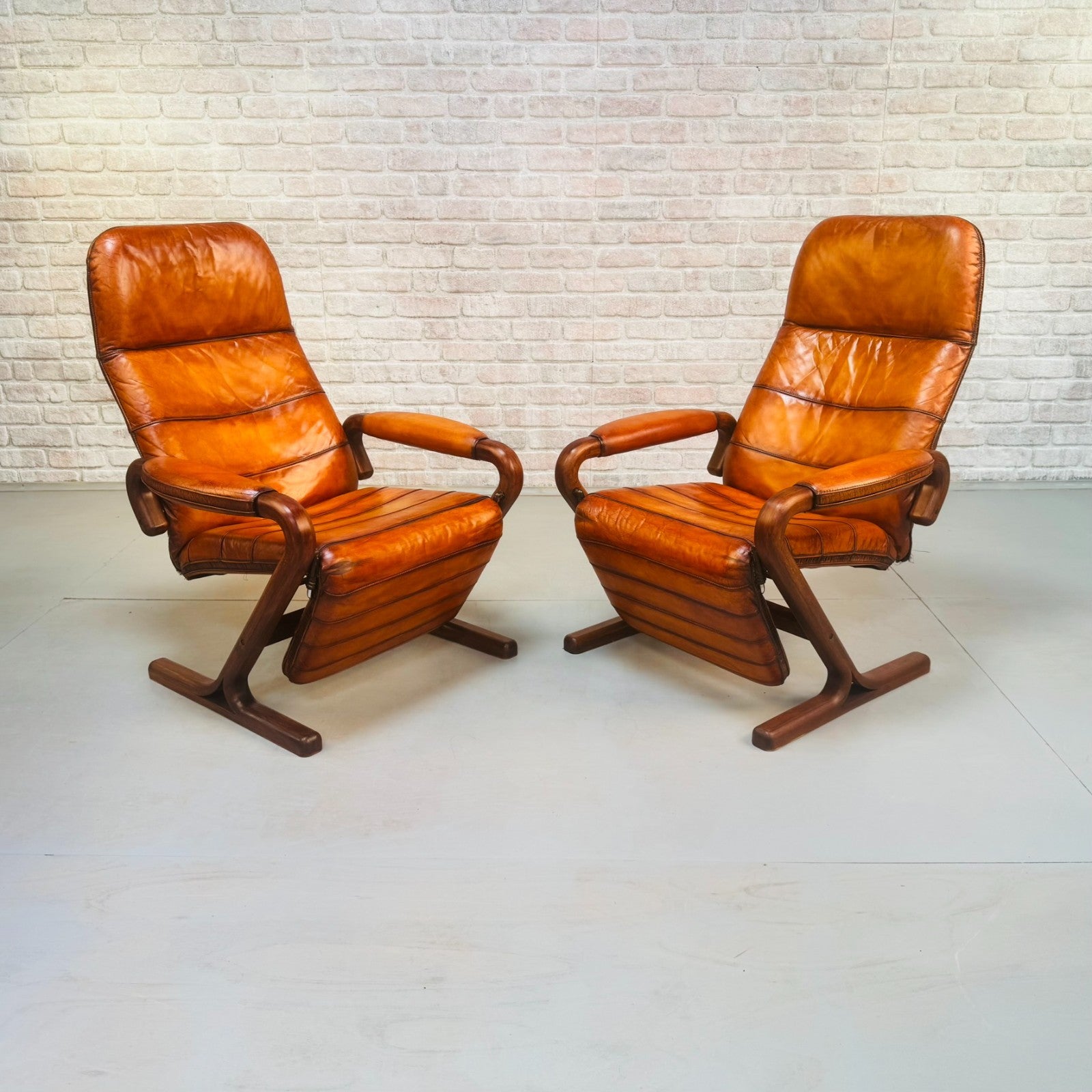 Pair of Vintage Danish Zero Gravity Reclining Tan Leather Armchairs Teak Frame