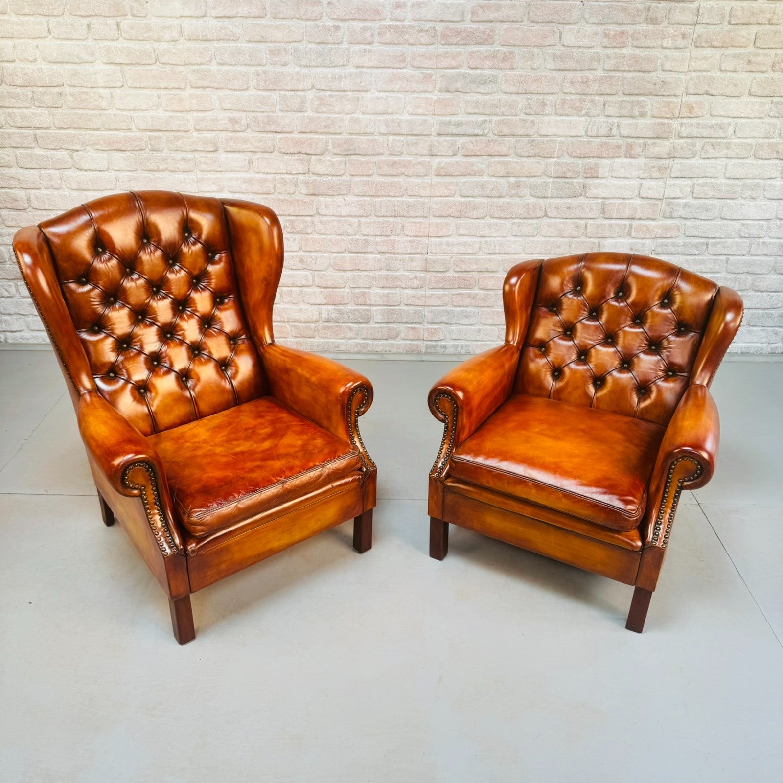 Vintage Pair of Danish Tan Leather Wingback Chairs