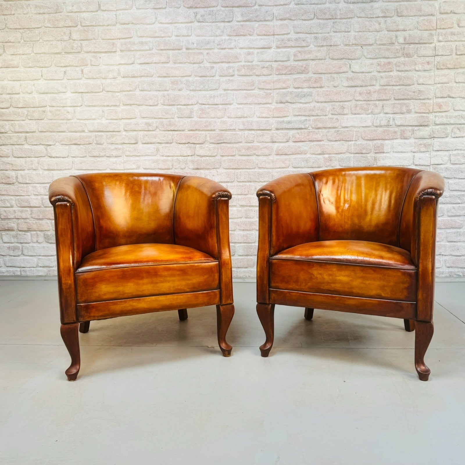 Vintage Pair of Danish Light Tan Leather Tub Chairs