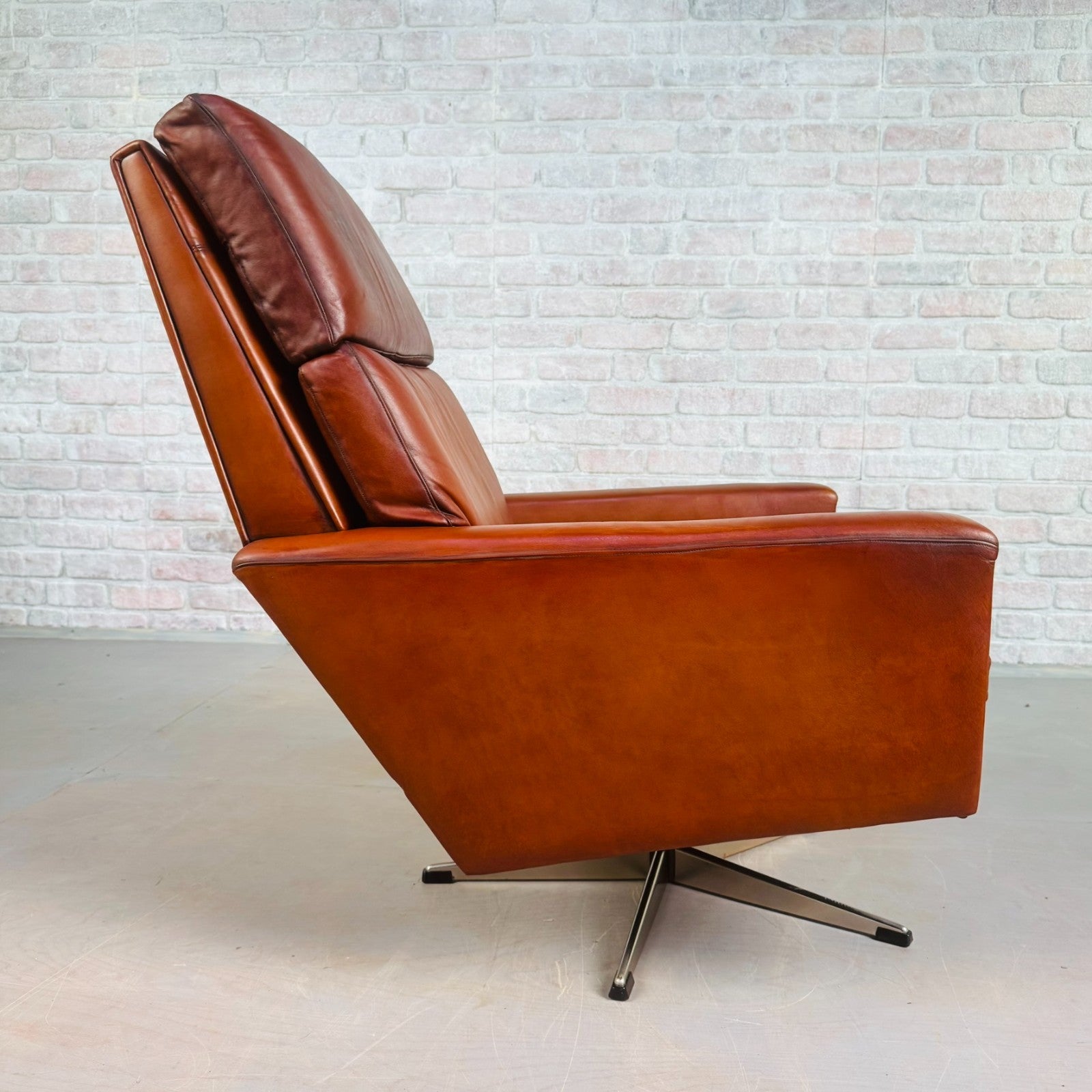 Vintage Danish Tan Leather Swivel Armchair