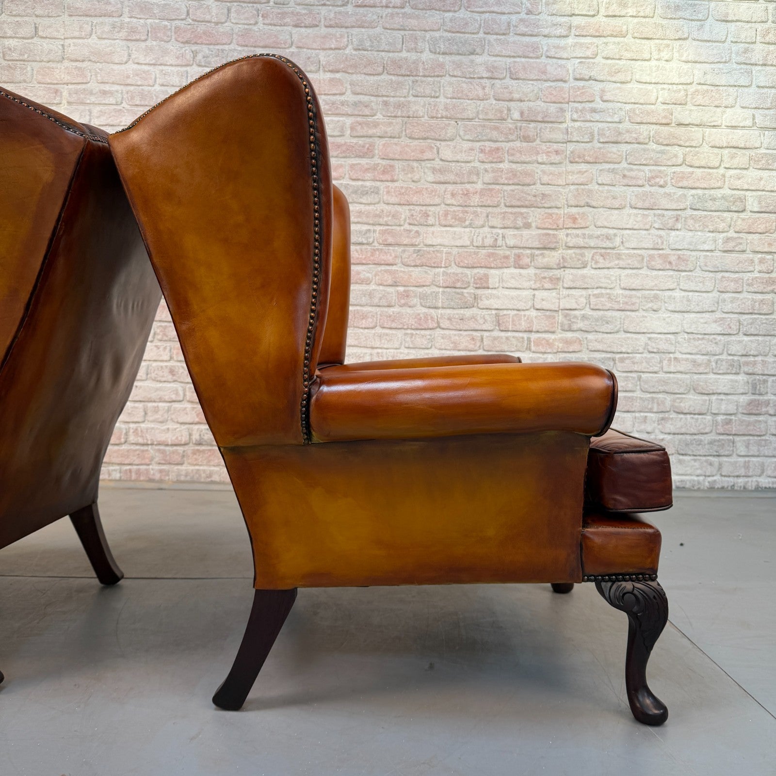Pair of Vintage English Chesterfield Tan Hand-Dyed Leather Wingback Armchairs