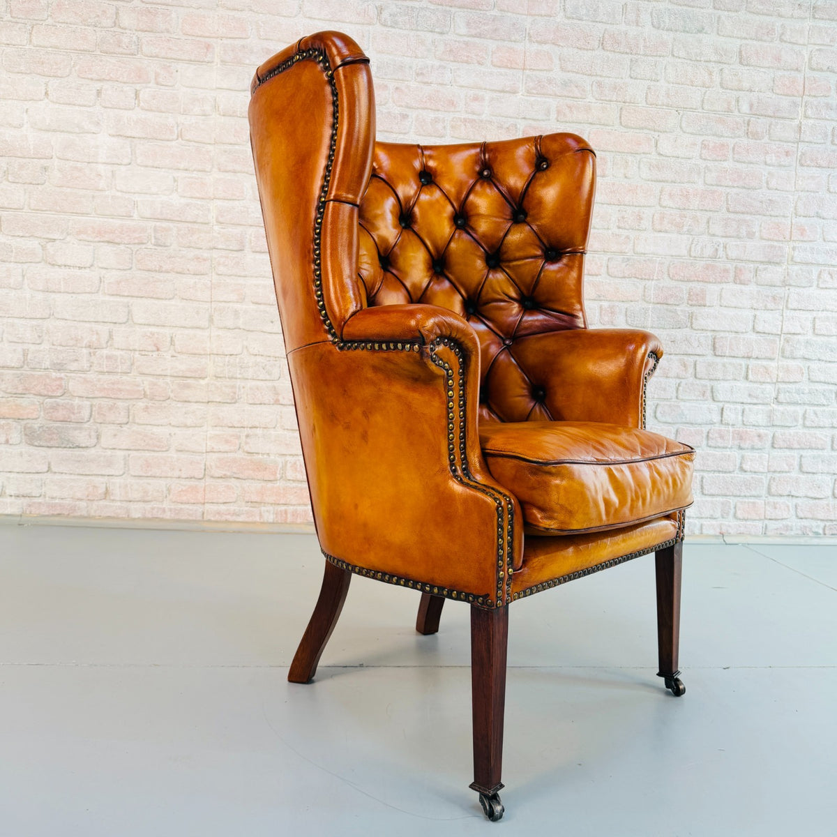 Vintage English Barrel Back Hand Dyed Tan Leather Wingback Armchair