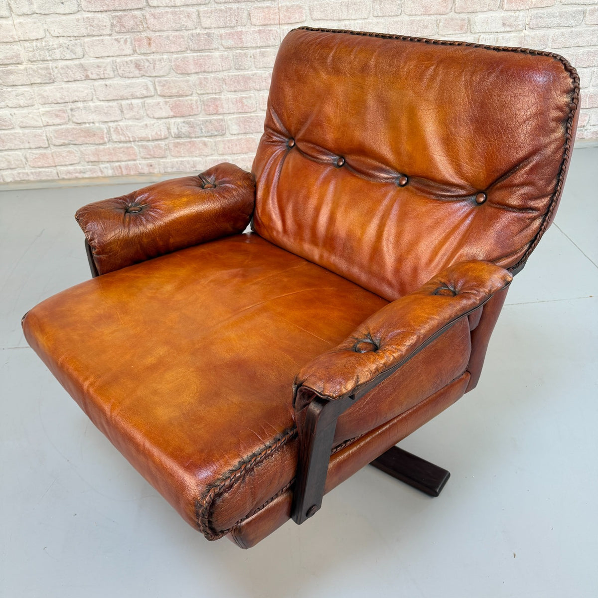 Vintage 1970s Arne Norell Swedish Tan Leather Swivel Chair & Footstool