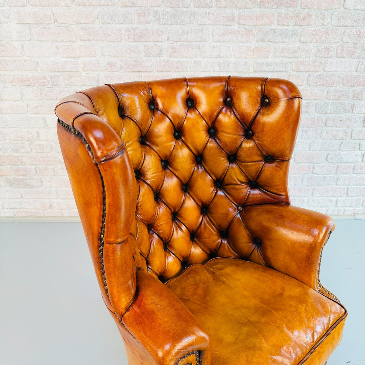Vintage English Barrel Back Hand Dyed Tan Leather Wingback Armchair