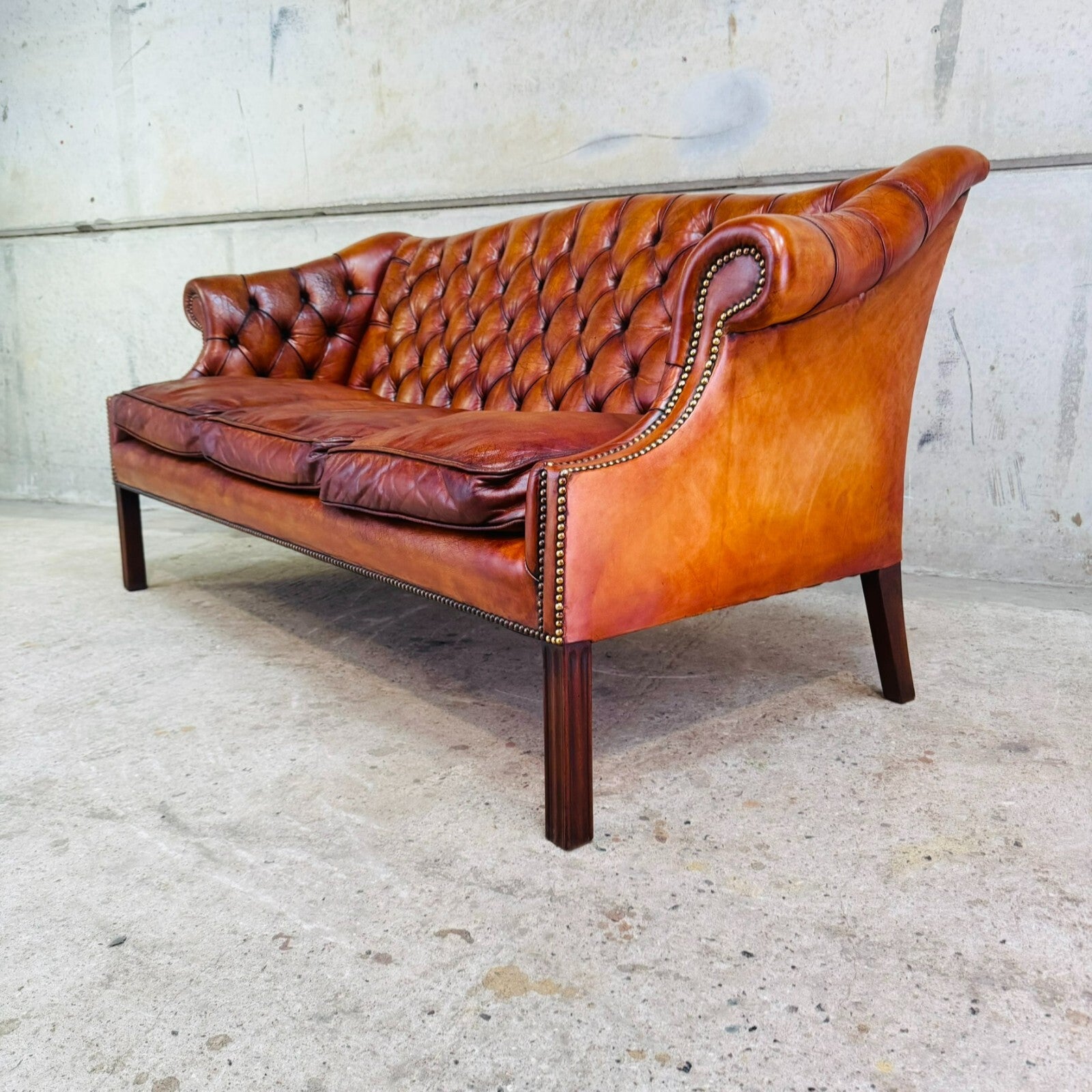 Mid-Century English Gainsborough Cognac Leather Chesterfield Three-Seater Sofa