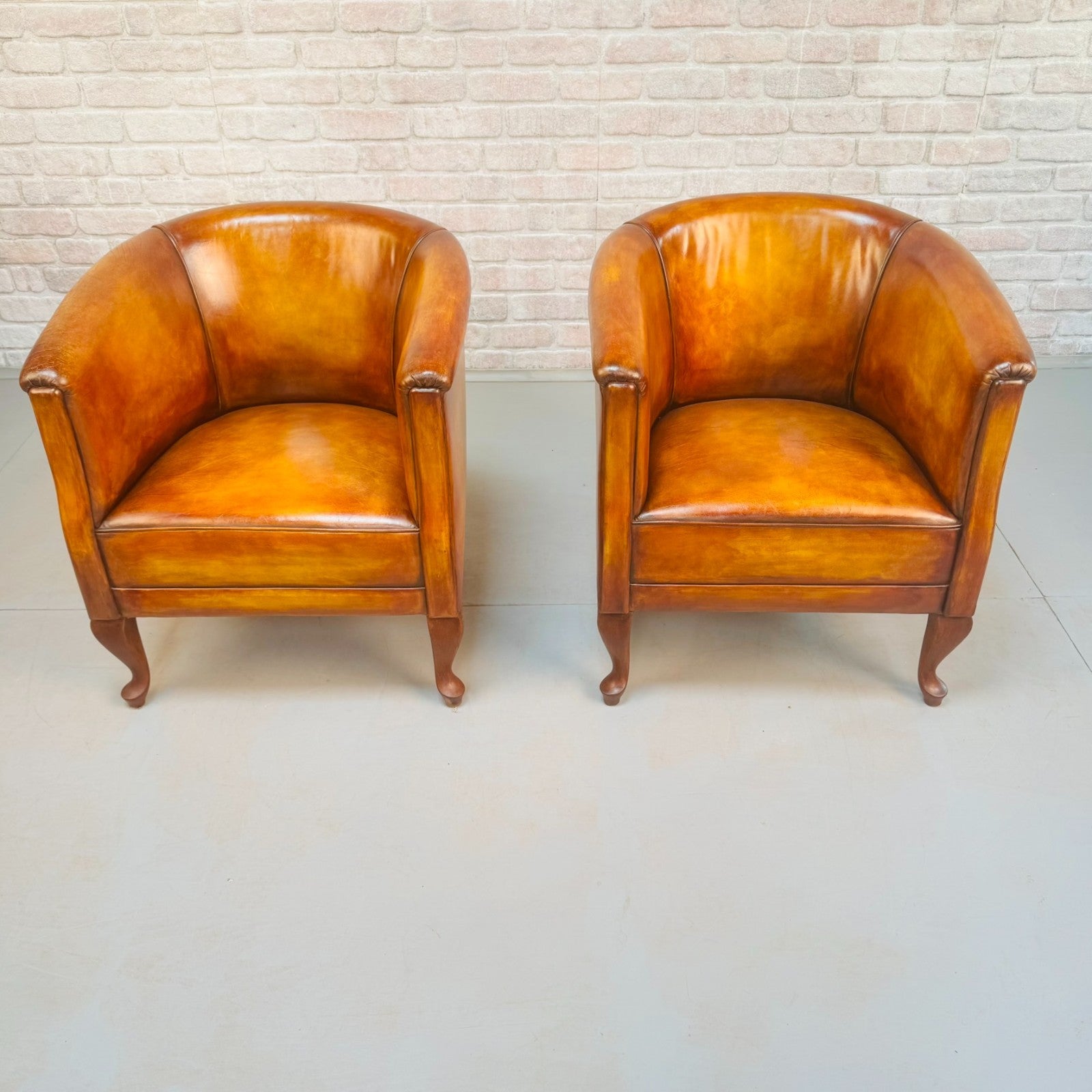 Vintage Pair of Danish Light Tan Leather Tub Chairs