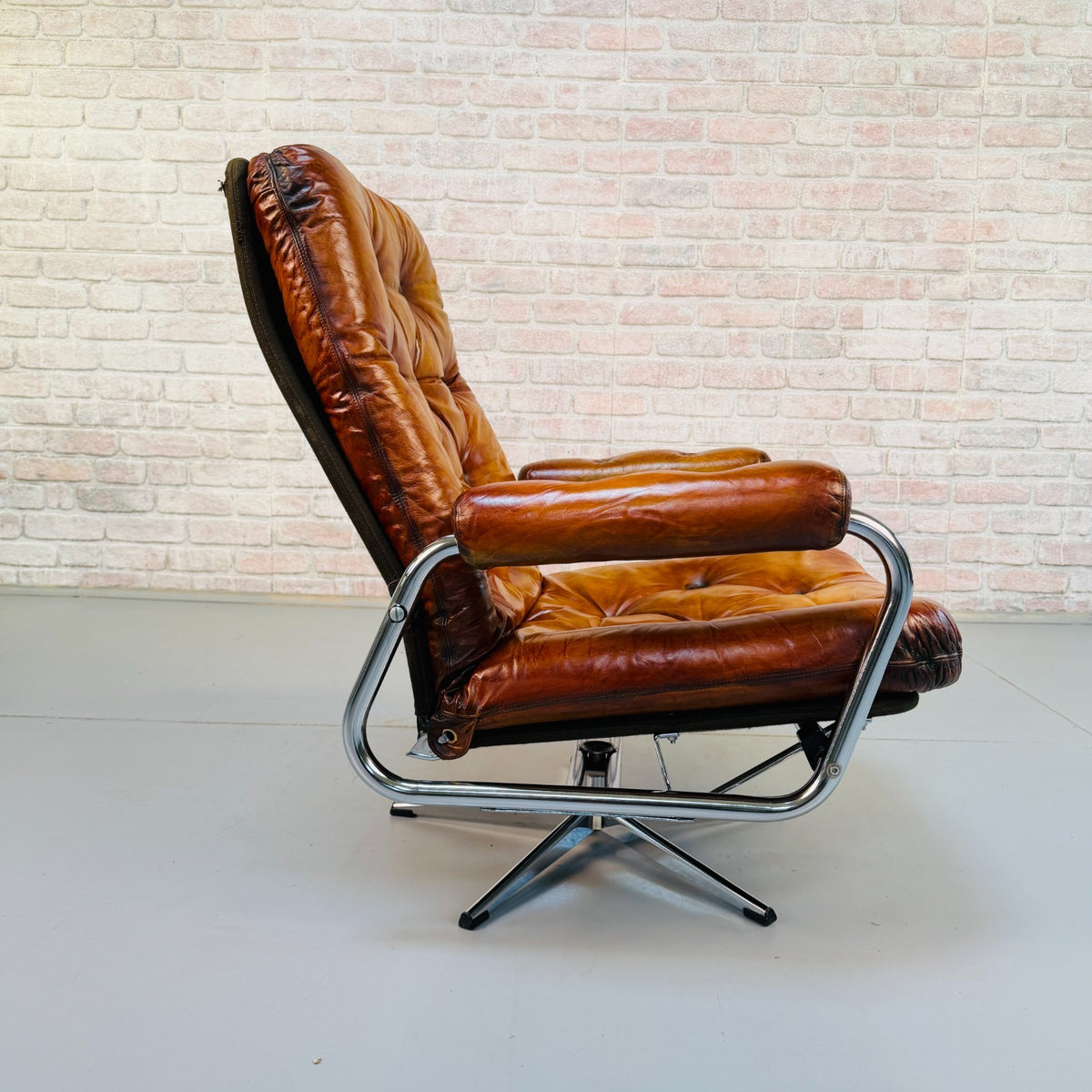 1970s Vintage Danish Tan Leather Swivel Recliner Armchair Chrome Frame