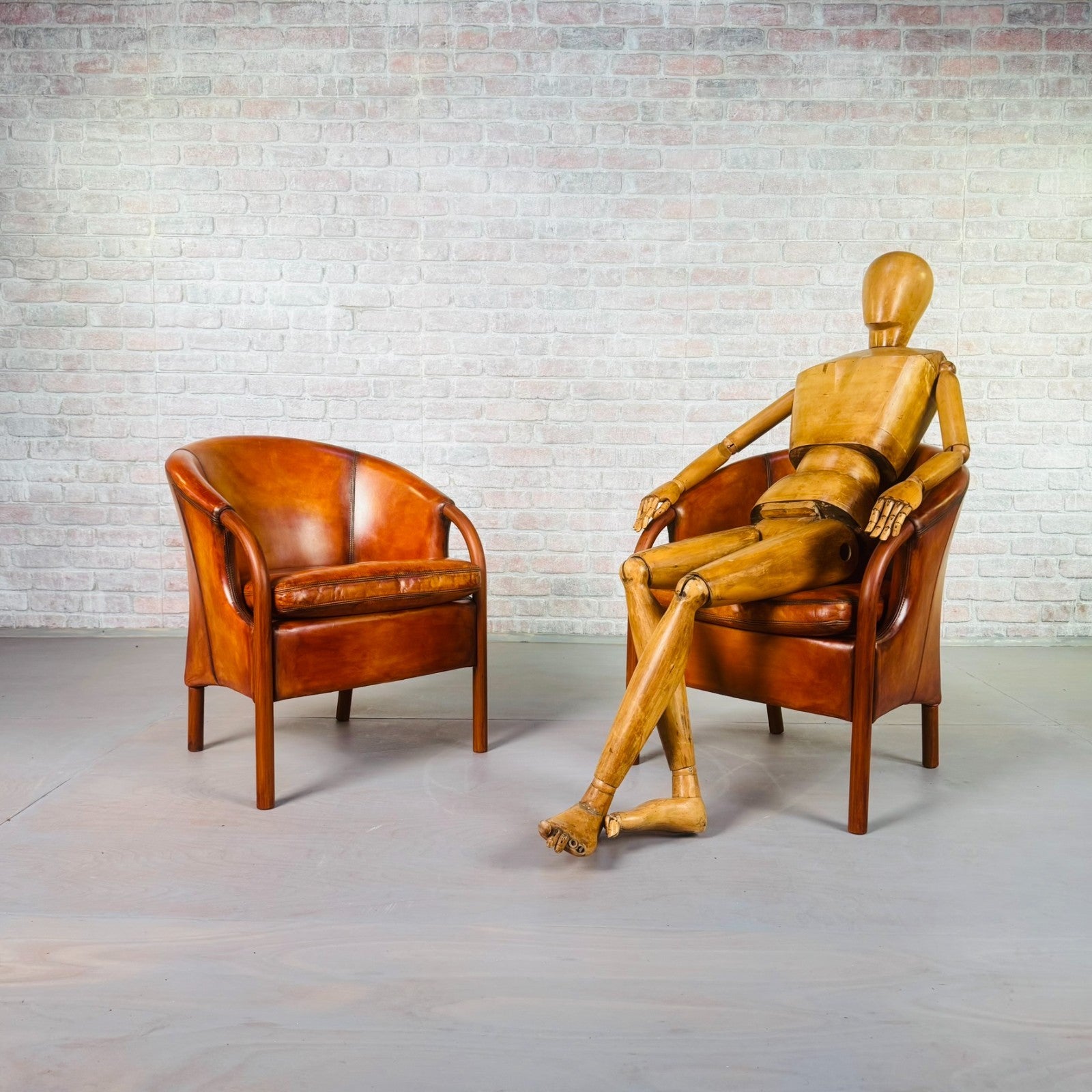 Pair of Vintage Danish Tan Leather Tub Chairs by Stouby