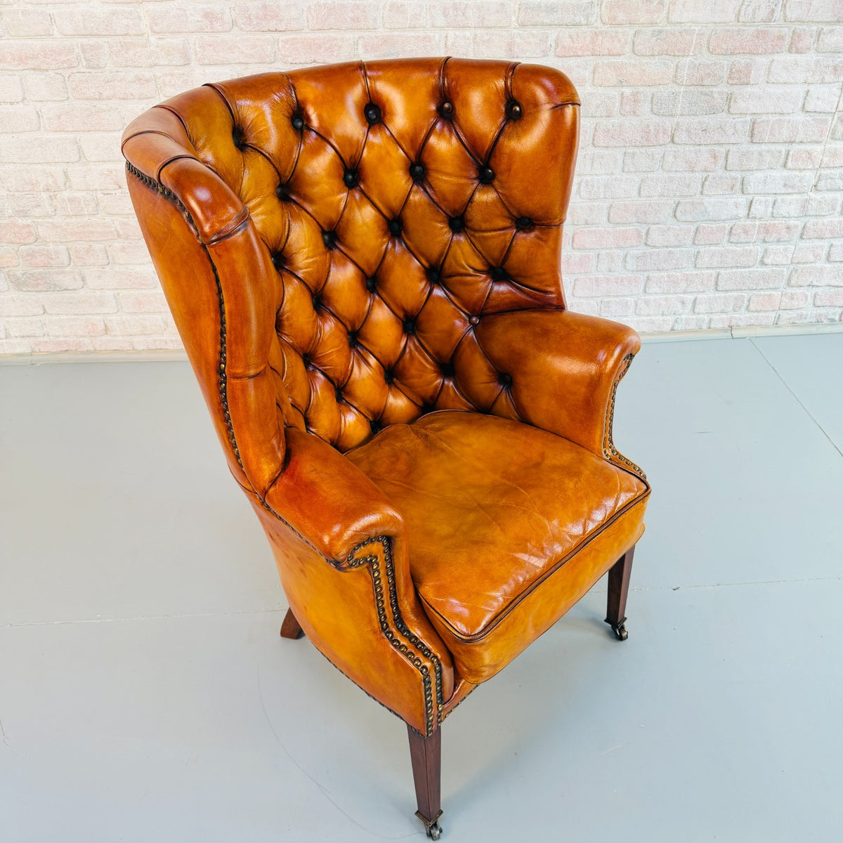Vintage English Barrel Back Hand Dyed Tan Leather Wingback Armchair