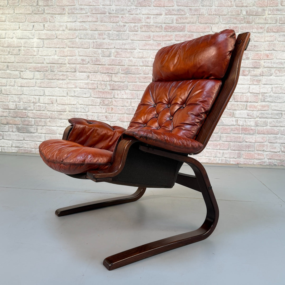 1970s Vintage Scandinavian Cognac Leather Cantilever Armchair Bentwood Frame