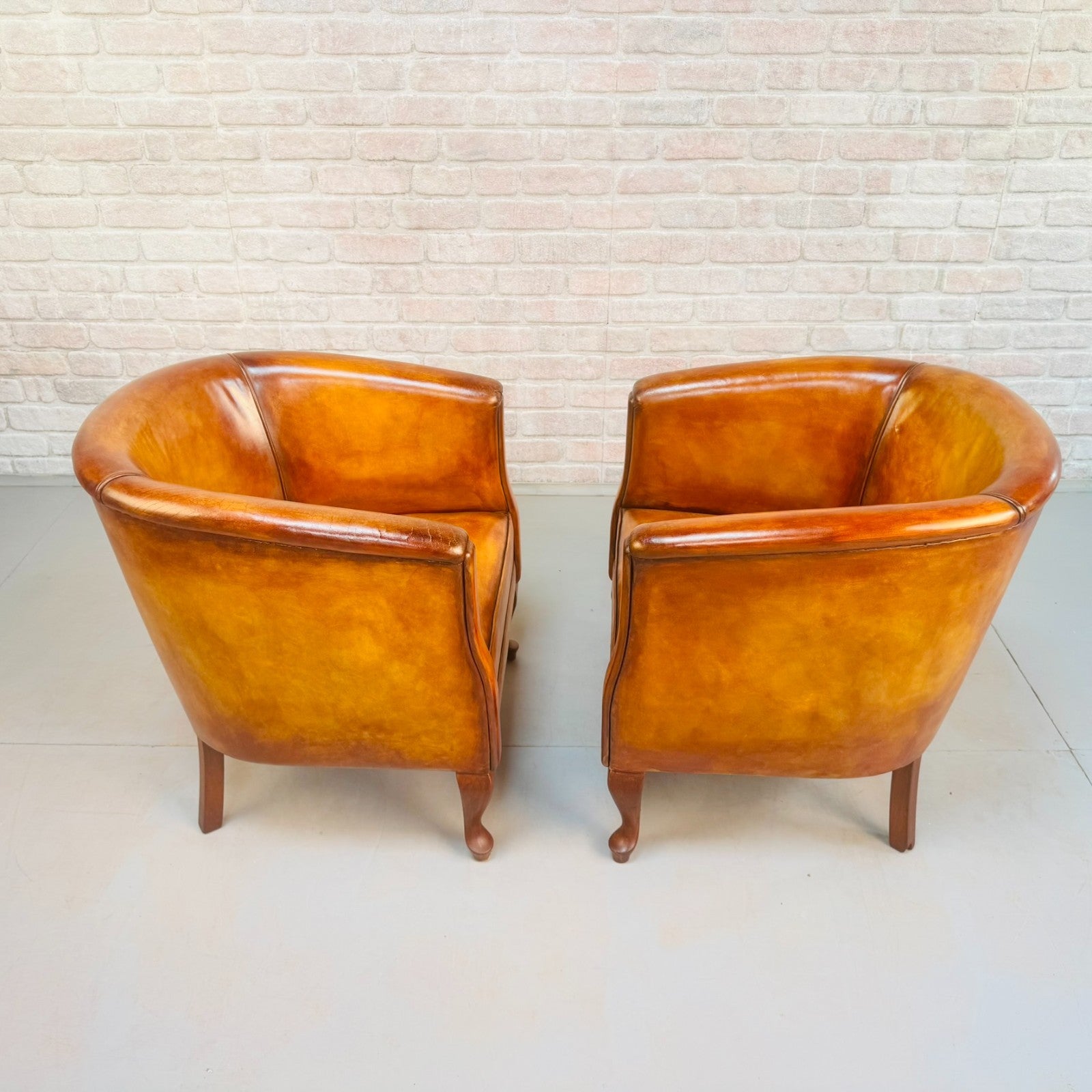 Vintage Pair of Danish Light Tan Leather Tub Chairs
