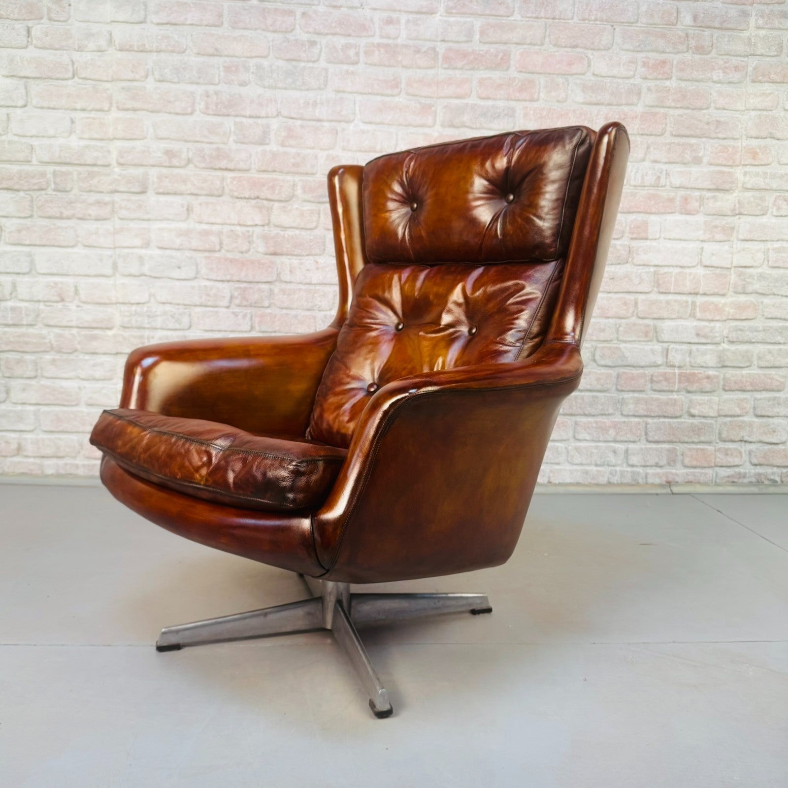 1970s Danish Swivel Egg Tan Leather Chair