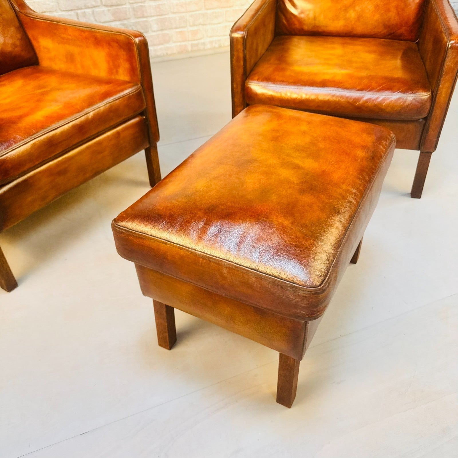 Pair Vintage Danish Wingback Chairs & Footstool Tan Leather Lounge Set