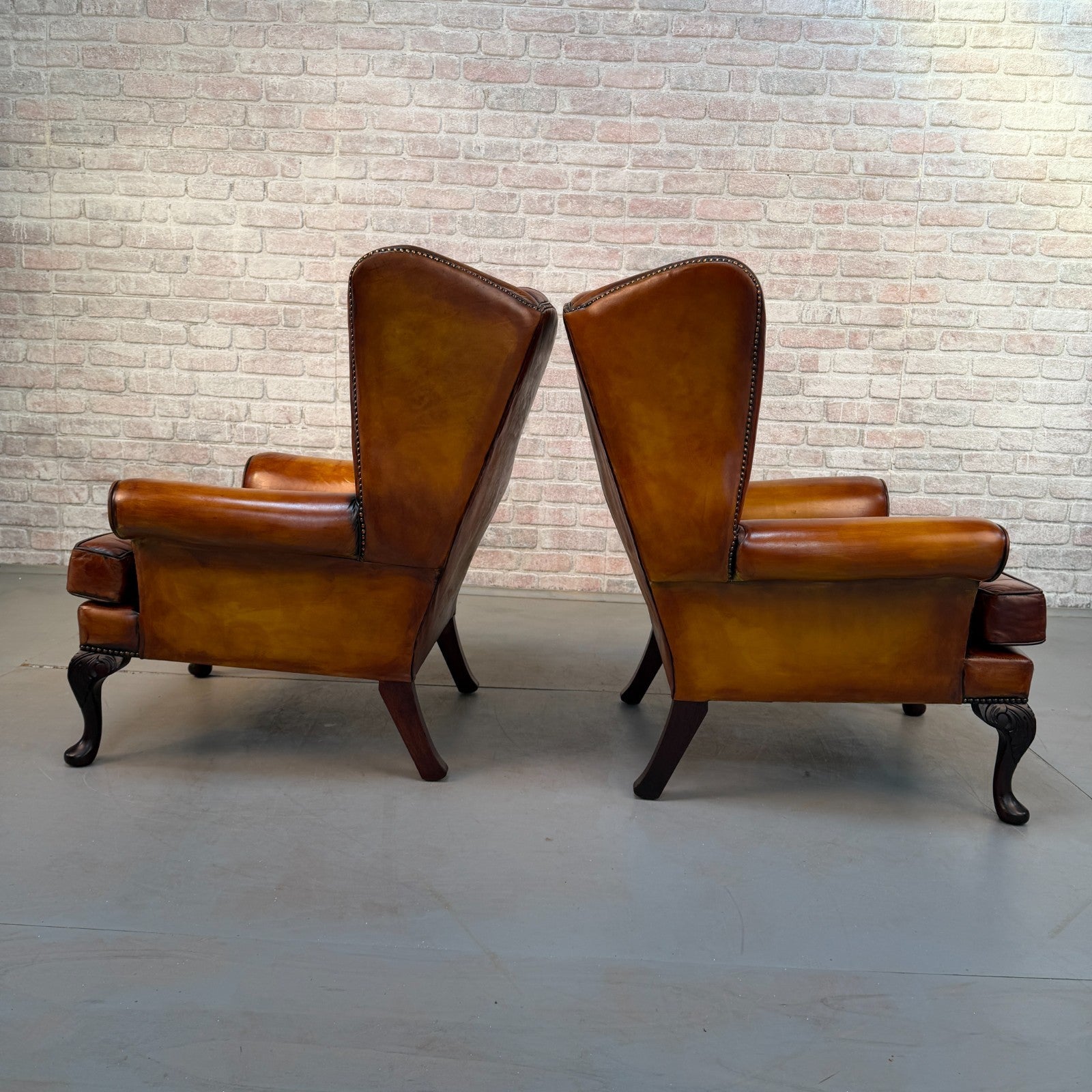 Pair of Vintage English Chesterfield Tan Hand-Dyed Leather Wingback Armchairs