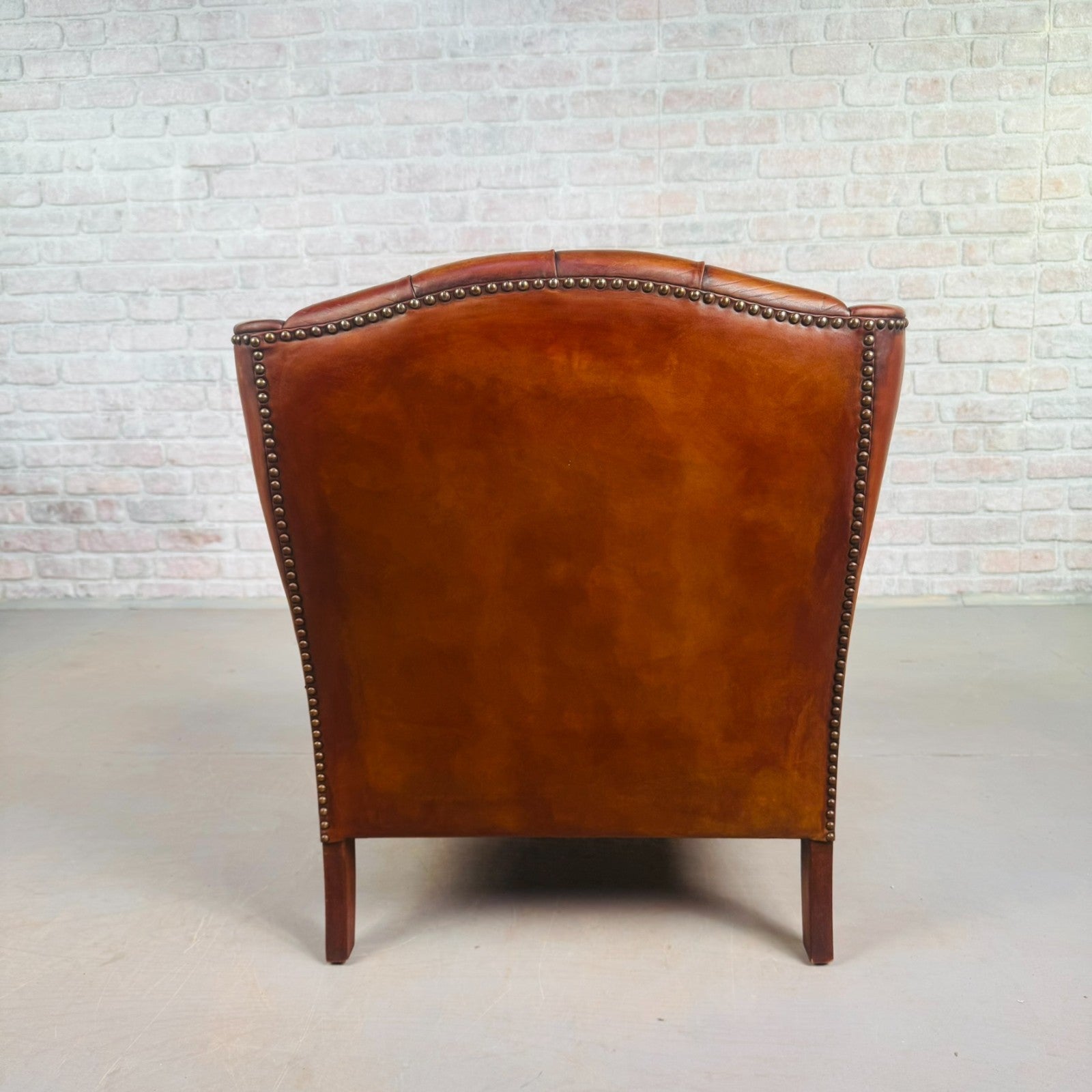 Neat Vintage Danish Tan Leather Armchair