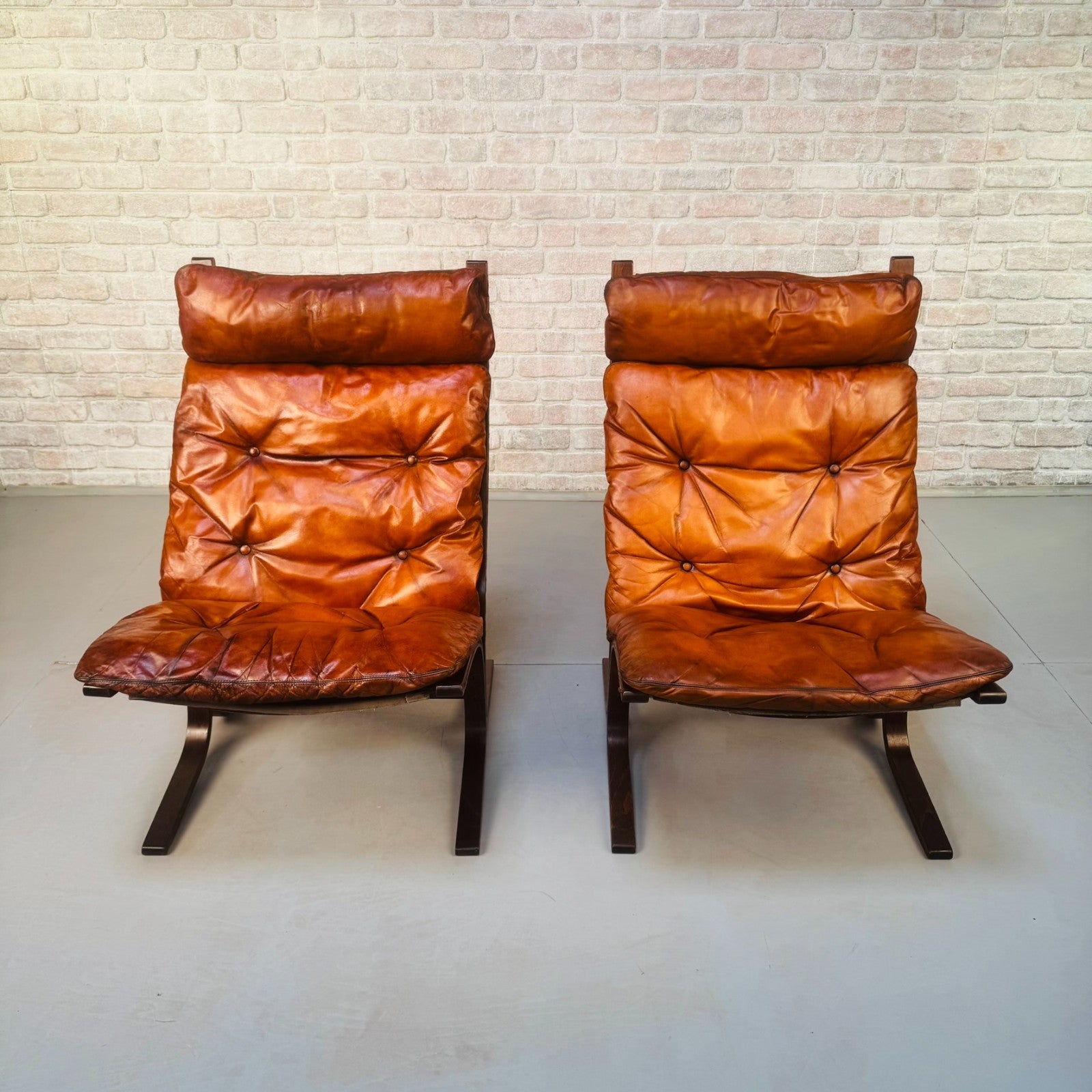 Pair of 1970s Westnofa Siesta High Back Lounge Chairs by Ingmar Relling