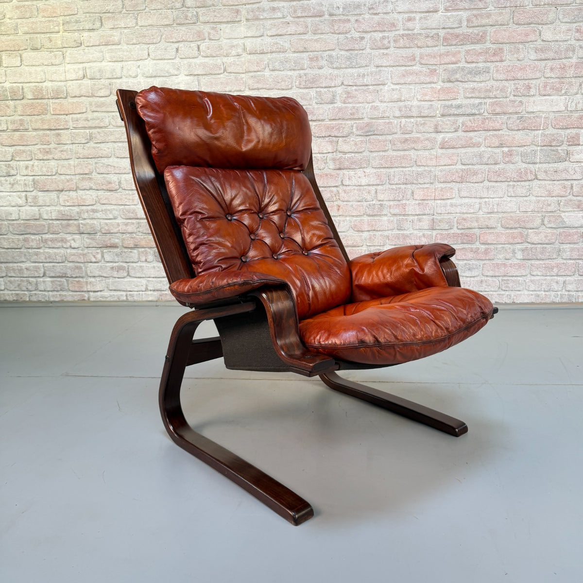 1970s Vintage Scandinavian Cognac Leather Cantilever Armchair Bentwood Frame