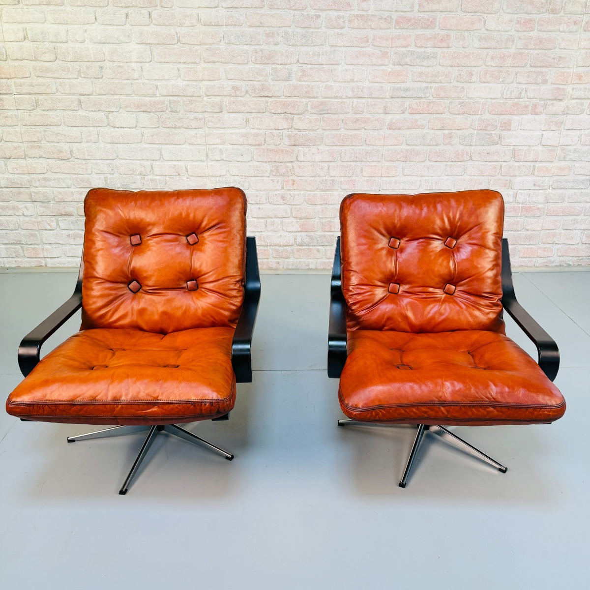 Pair Vintage Danish Cognac Tan Leather Swivel Armchairs Black Beech Frames