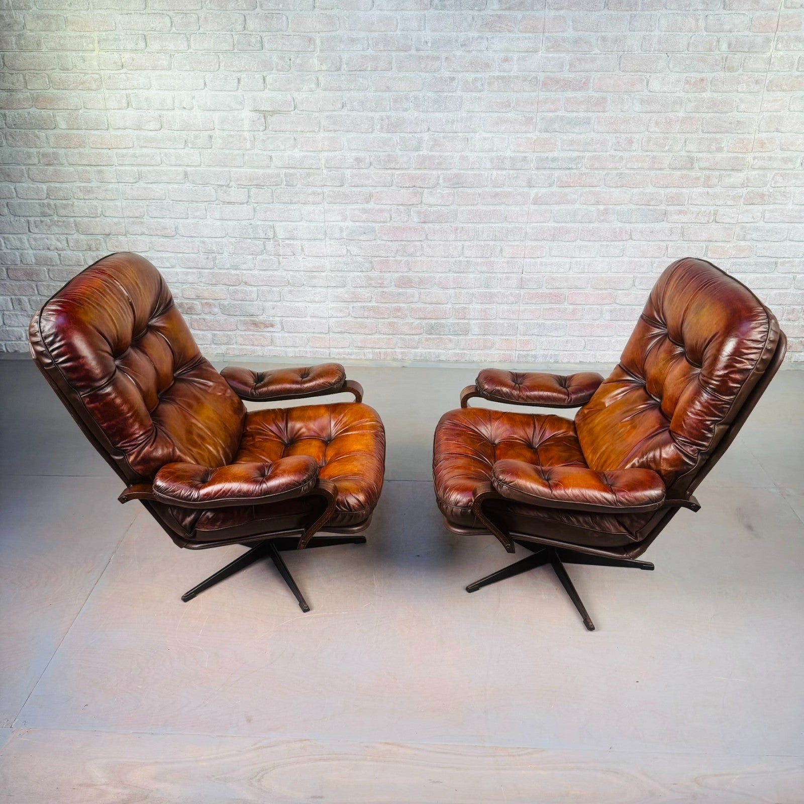 Pair of Vintage Danish Tan Leather Swivel Chairs  Stylish