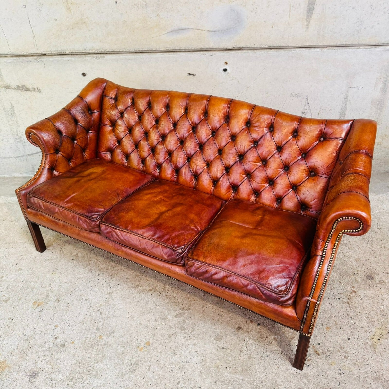 Mid-Century English Gainsborough Cognac Leather Chesterfield Three-Seater Sofa